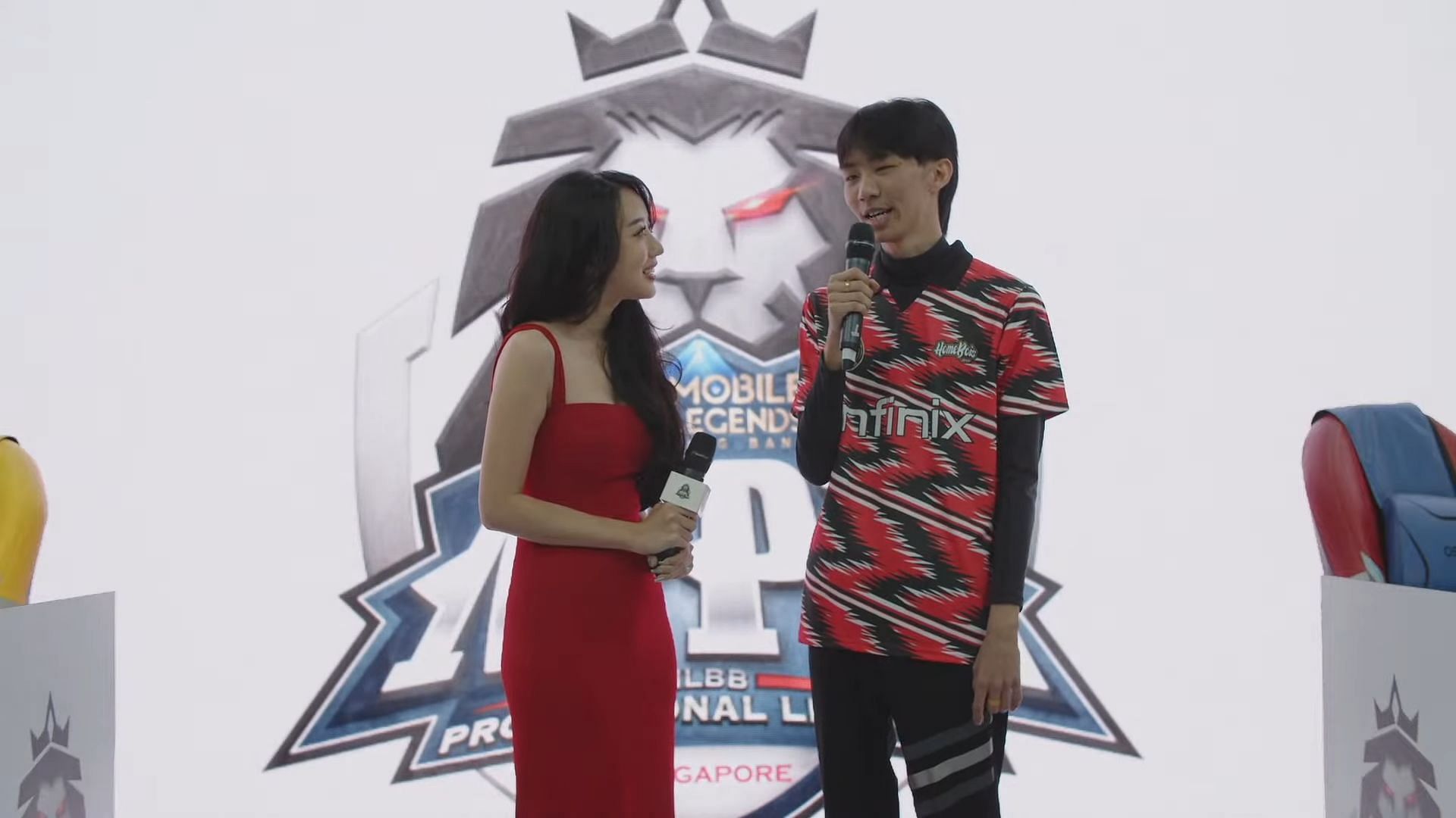 HomeBois SG&#039;s Gold Laner Russell &quot;Enya&quot; Lee in conversation with MPL SG Season 6 host Cheryl Yao in the post-match interview (Image via Moonton Games)