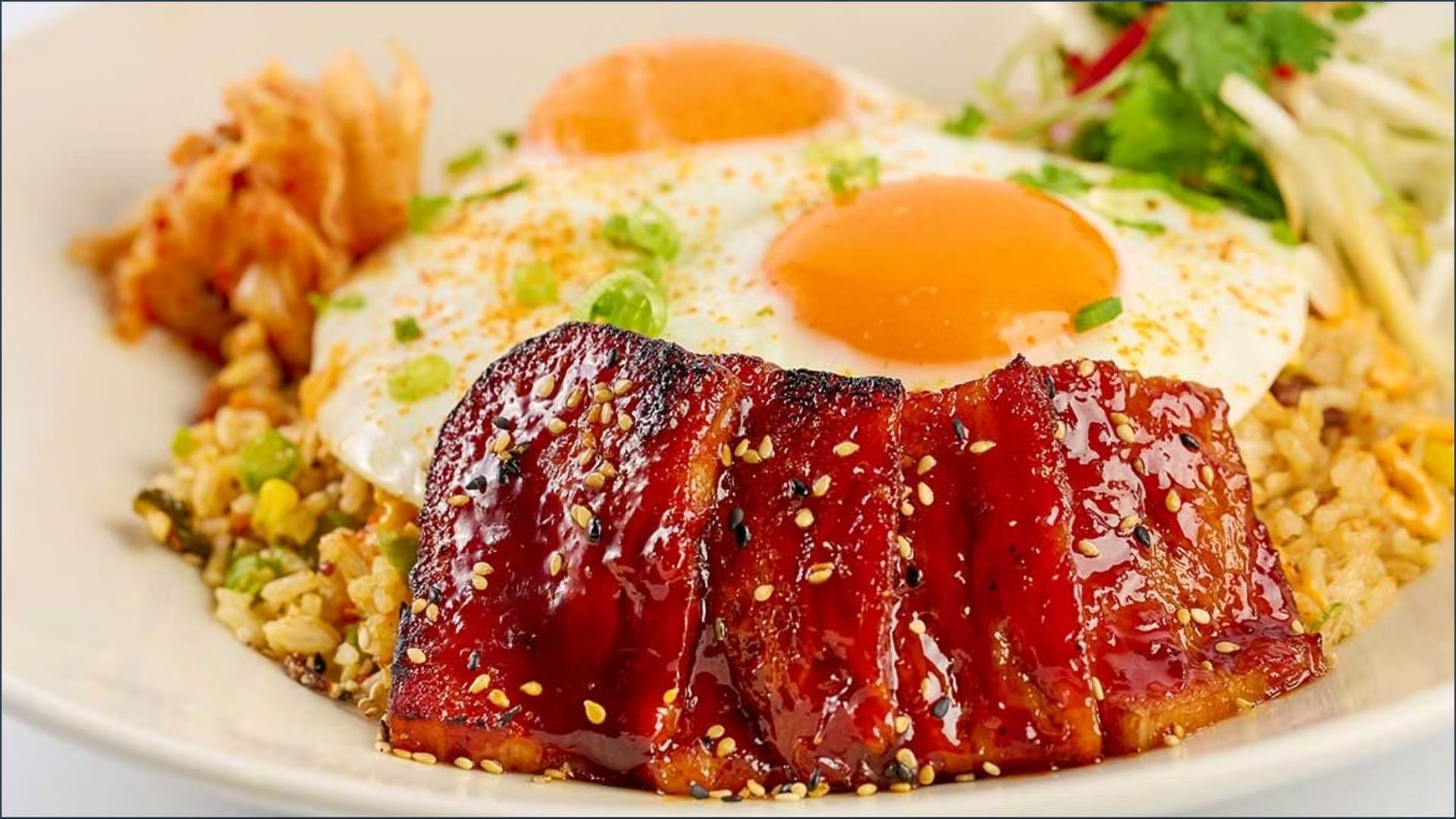 The new Kimchi Fried Rice &amp; Eggs offers a flavorful protein-packed brunch to keep you going every Saturday and Sunday (Image via The Cheesecake Factory)