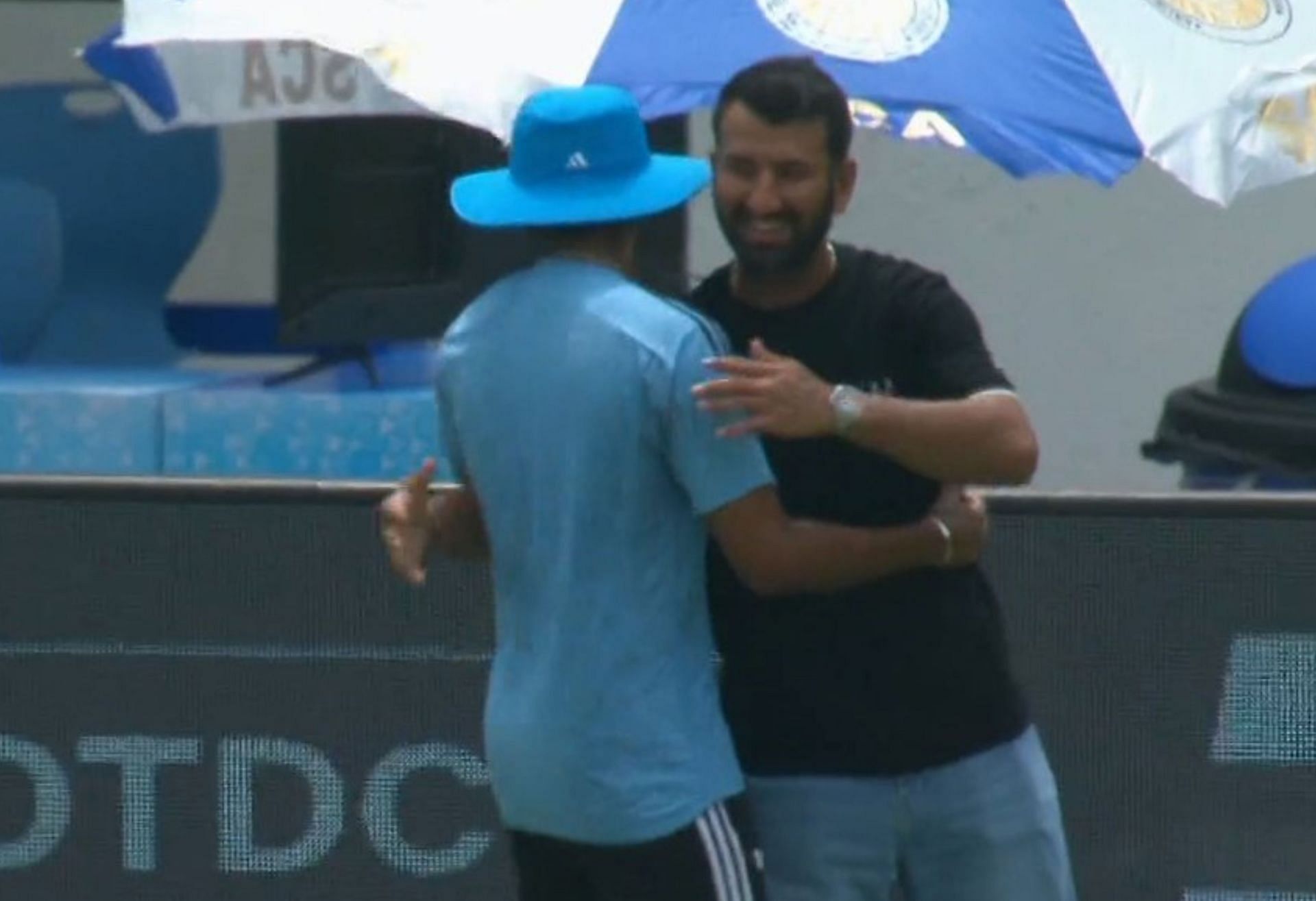 Cheteshwar Pujara meeting with Team India players in Rajkot. 