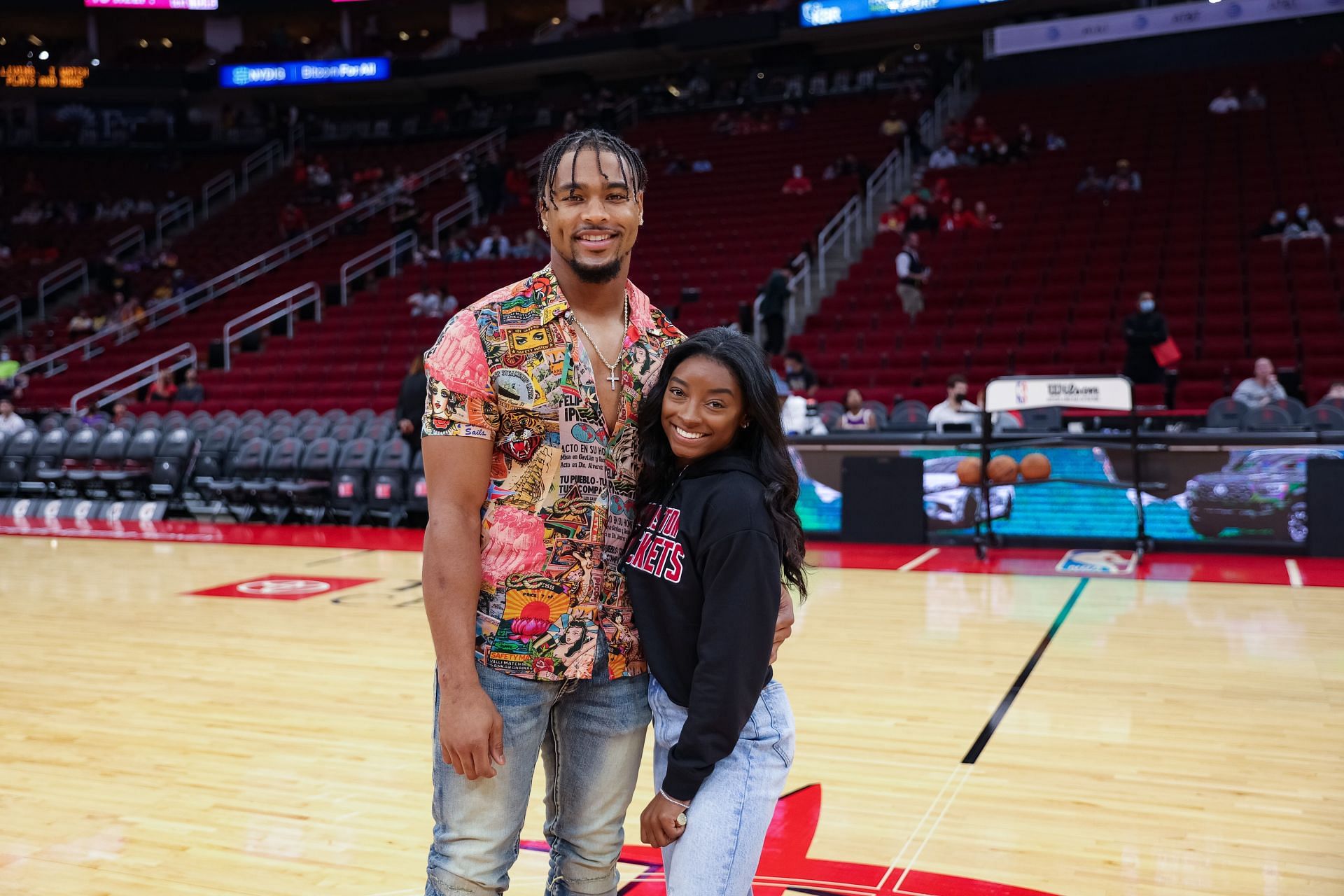 Simone Biles and Jonathan Owens at the Los Angeles Lakers vs. Houston Rockets game in 2021 in Houston, Texas