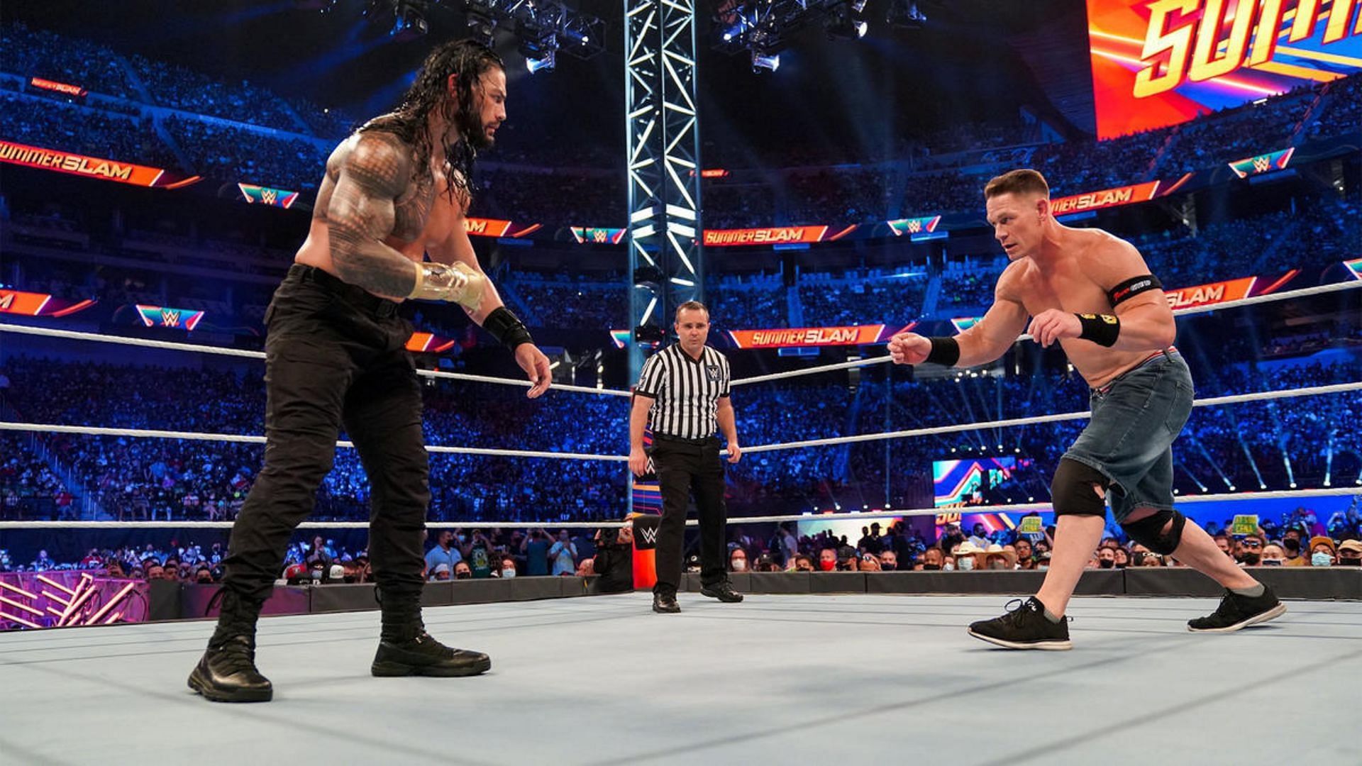 Roman Reigns and John Cena during a match. Image Credits: wwe.com 