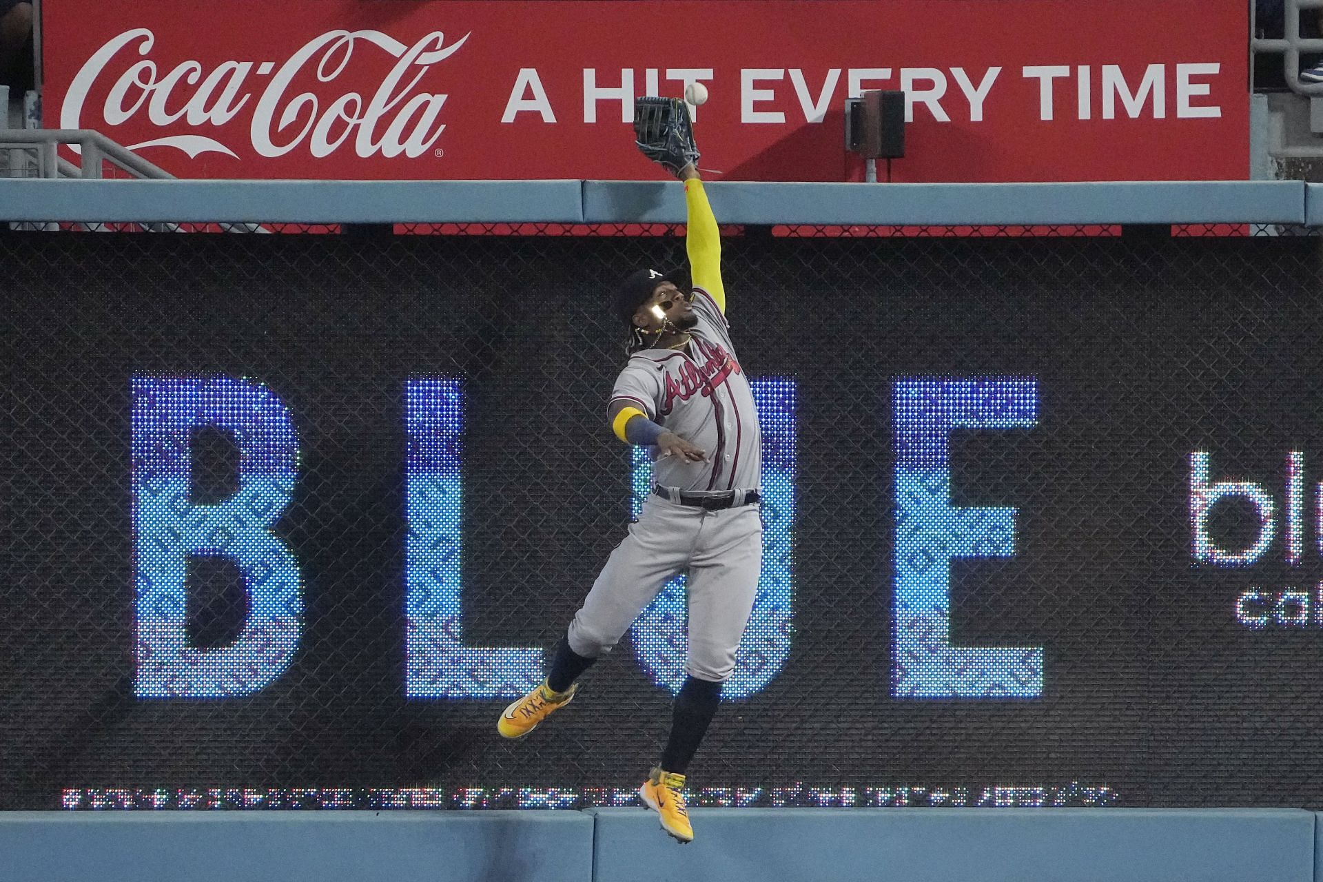 Atlanta Braves right fielder Ronald Acuna Jr. can&#039;t catch a ball hit for a three-run home run by Los Angeles Dodgers&#039; Mookie Betts.