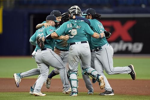 Seattle players celebrate after the team defeated the Tampa Bay Rays during a game in St. Petersburg, Florida