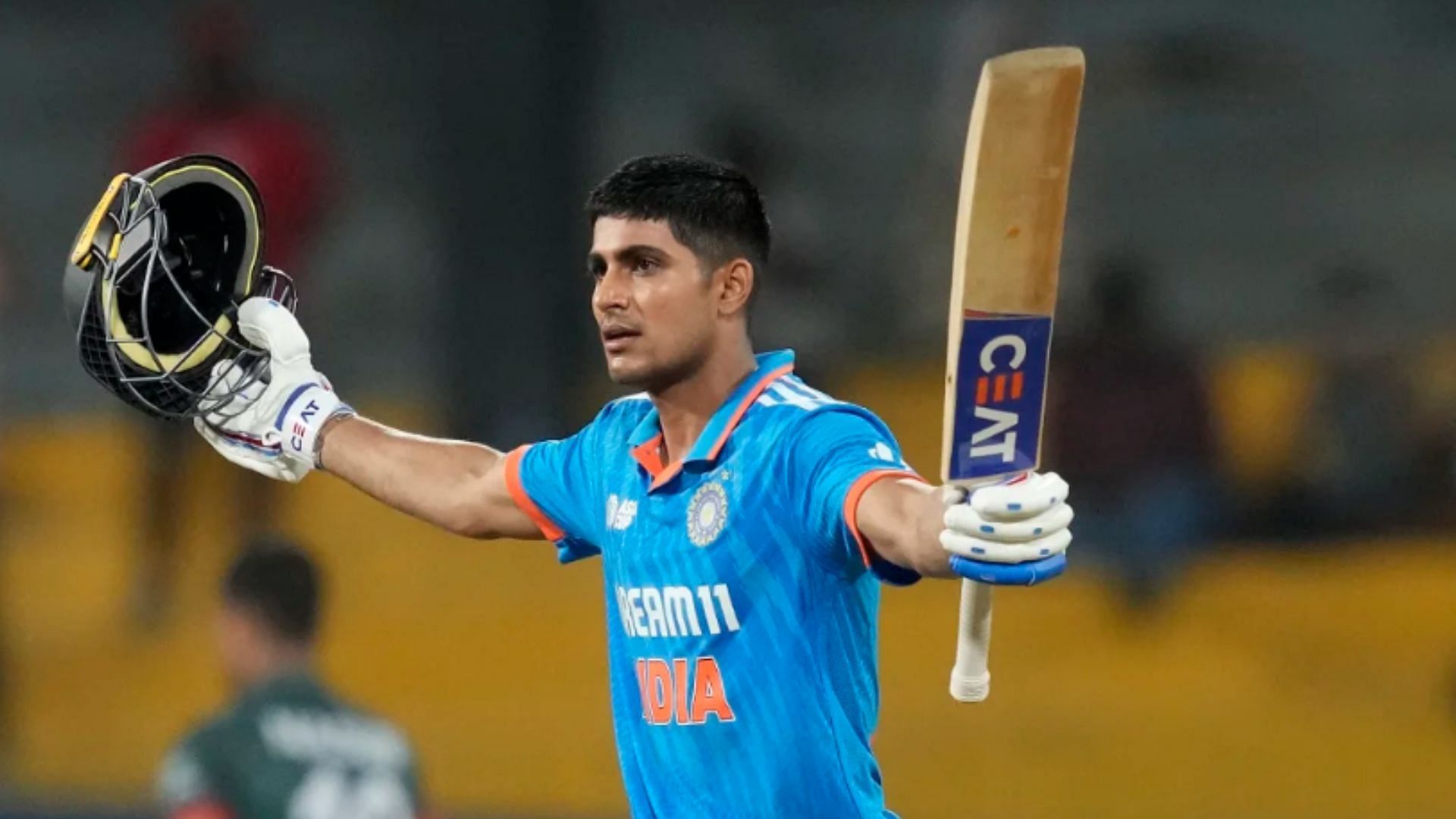 Shubman Gill raises his bat after scoring his 5th ODI century against Bangladesh in their final Super4 game. 