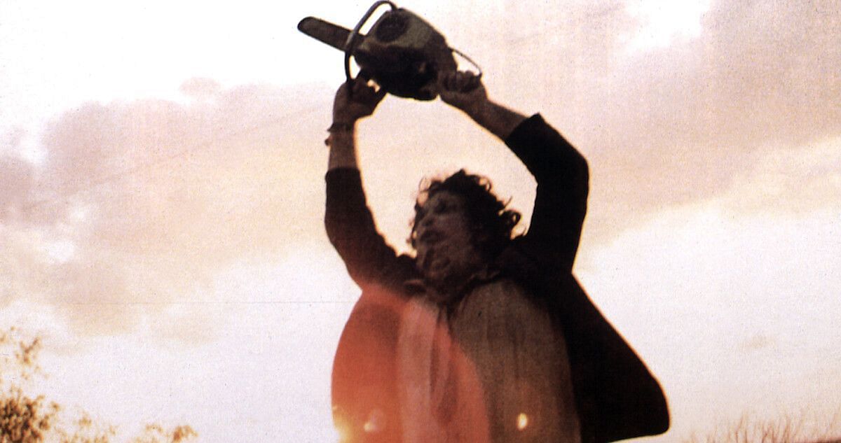 The infamous chainsaw-wielding antagonist, Leatherface, stands amidst a desolate Texan landscape, ready to strike (Image via Netflix)