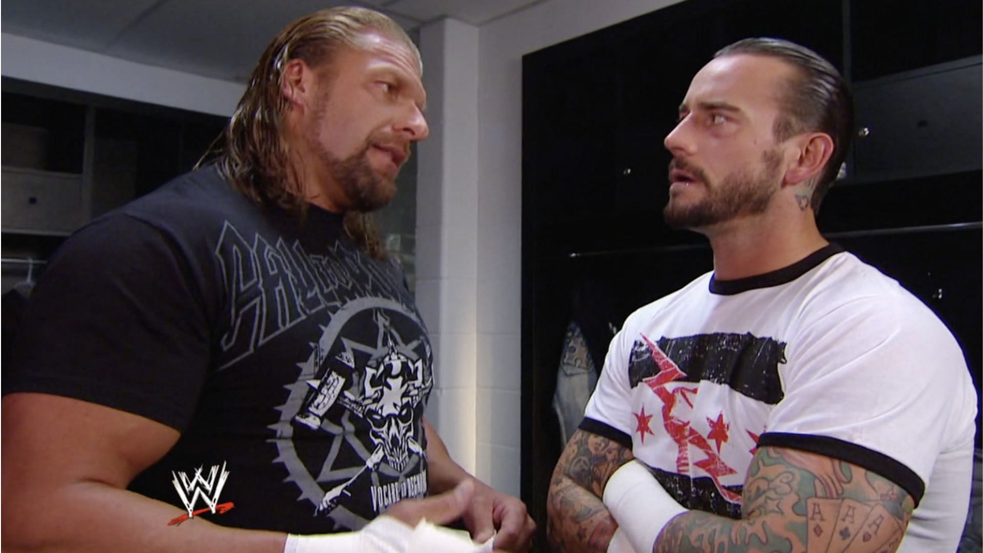 Triple H and CM Punk during a backstage WWE segment.