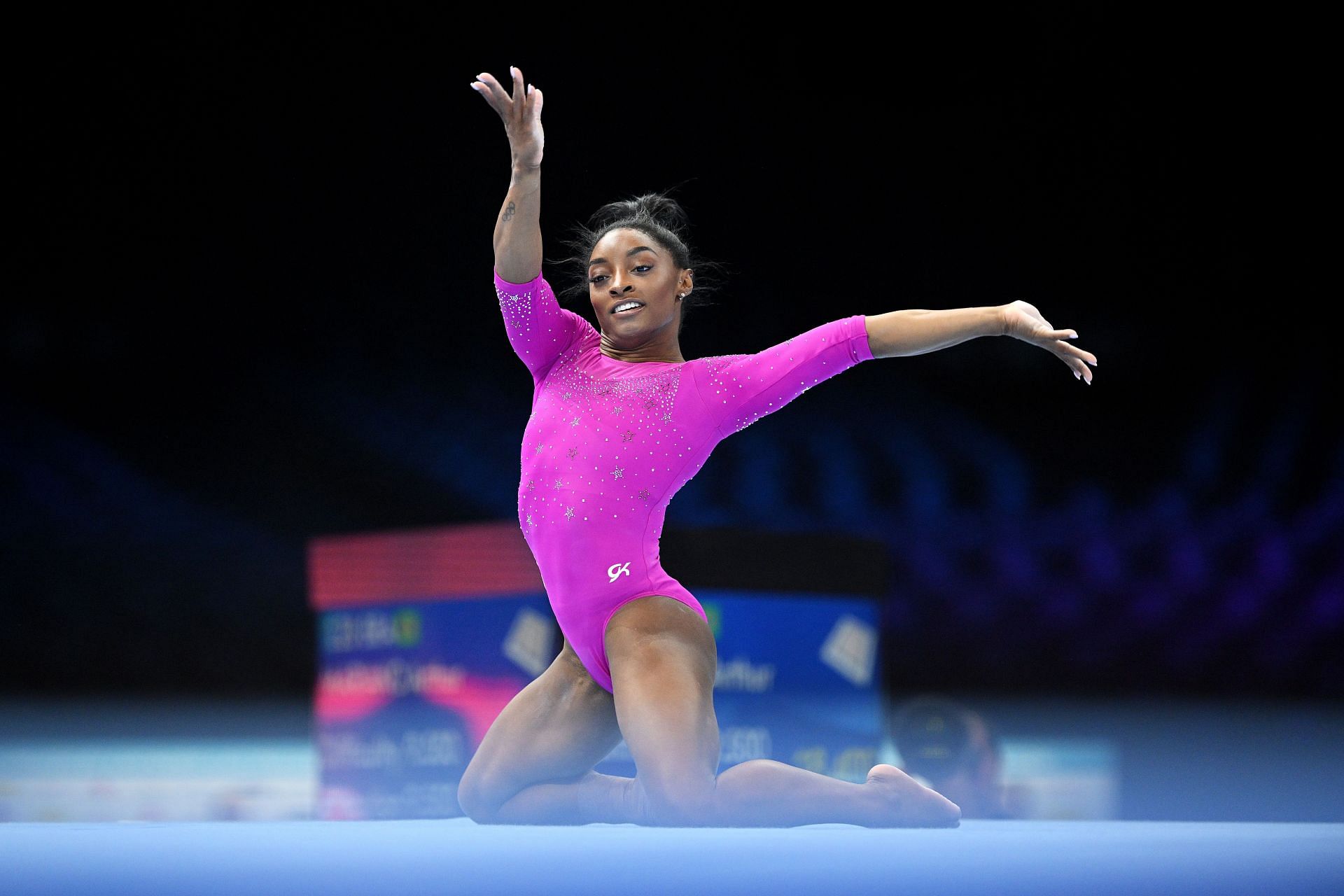 Simone Biles practices the floor exercise routine during the 2023 FIG Artistic Gymnastics World Championships in Antwerp, Belgium
