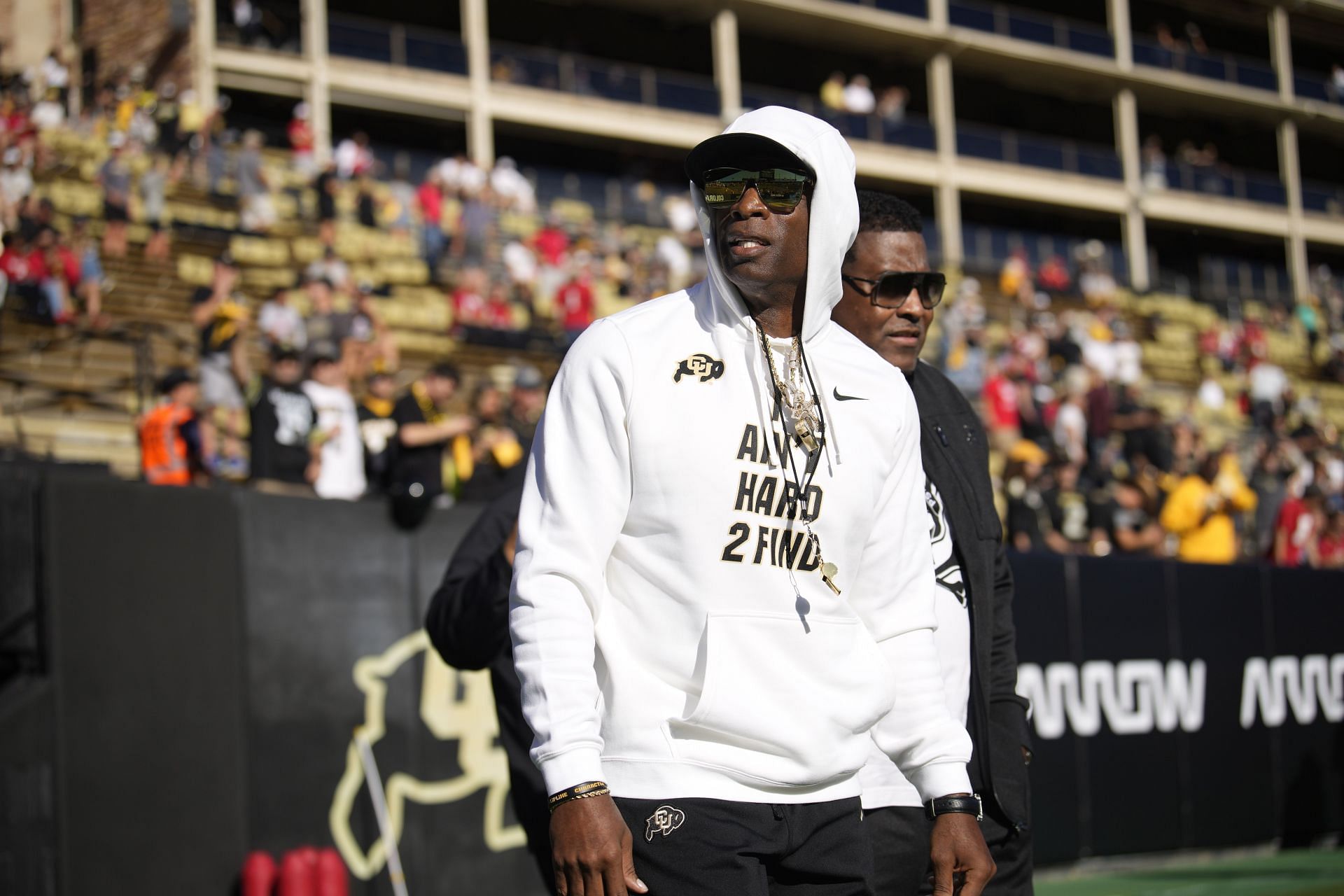 Former football great and CBS analyst Deion Sanders takes a selfie