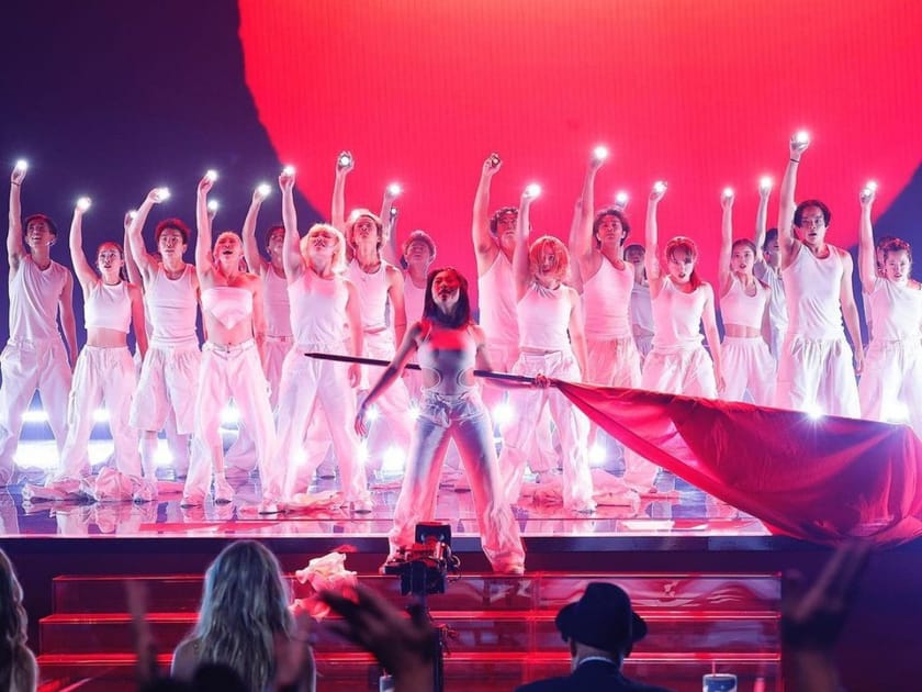 Who moved on in AGT tonight?