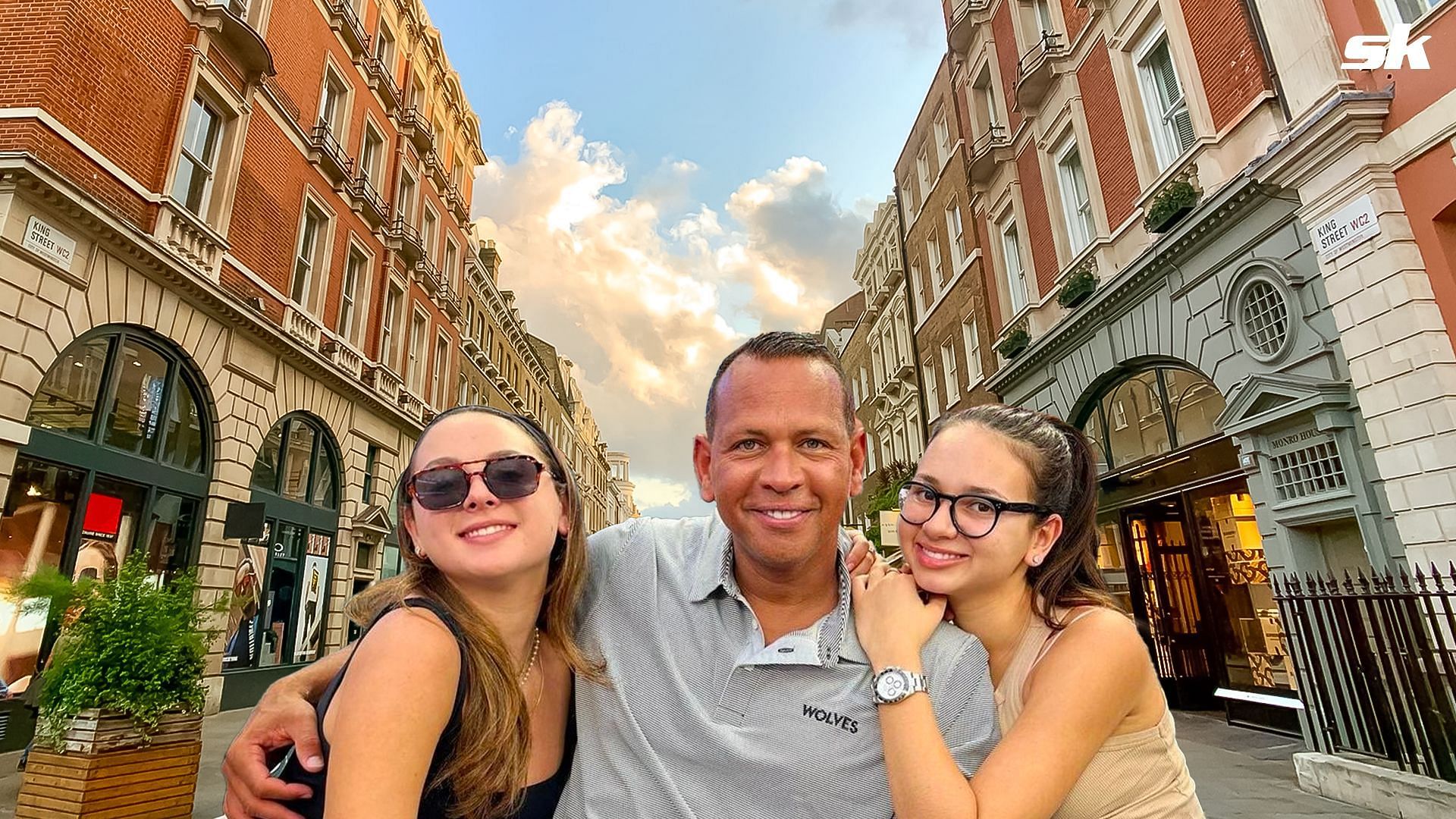 Alex Rodriguez, along with his daughters
