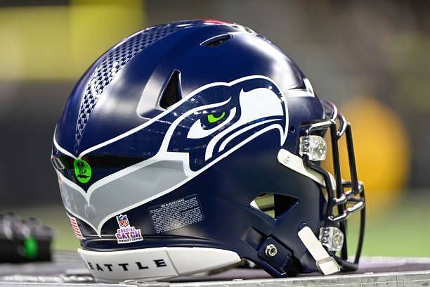 NFL helmet with green dot on the back