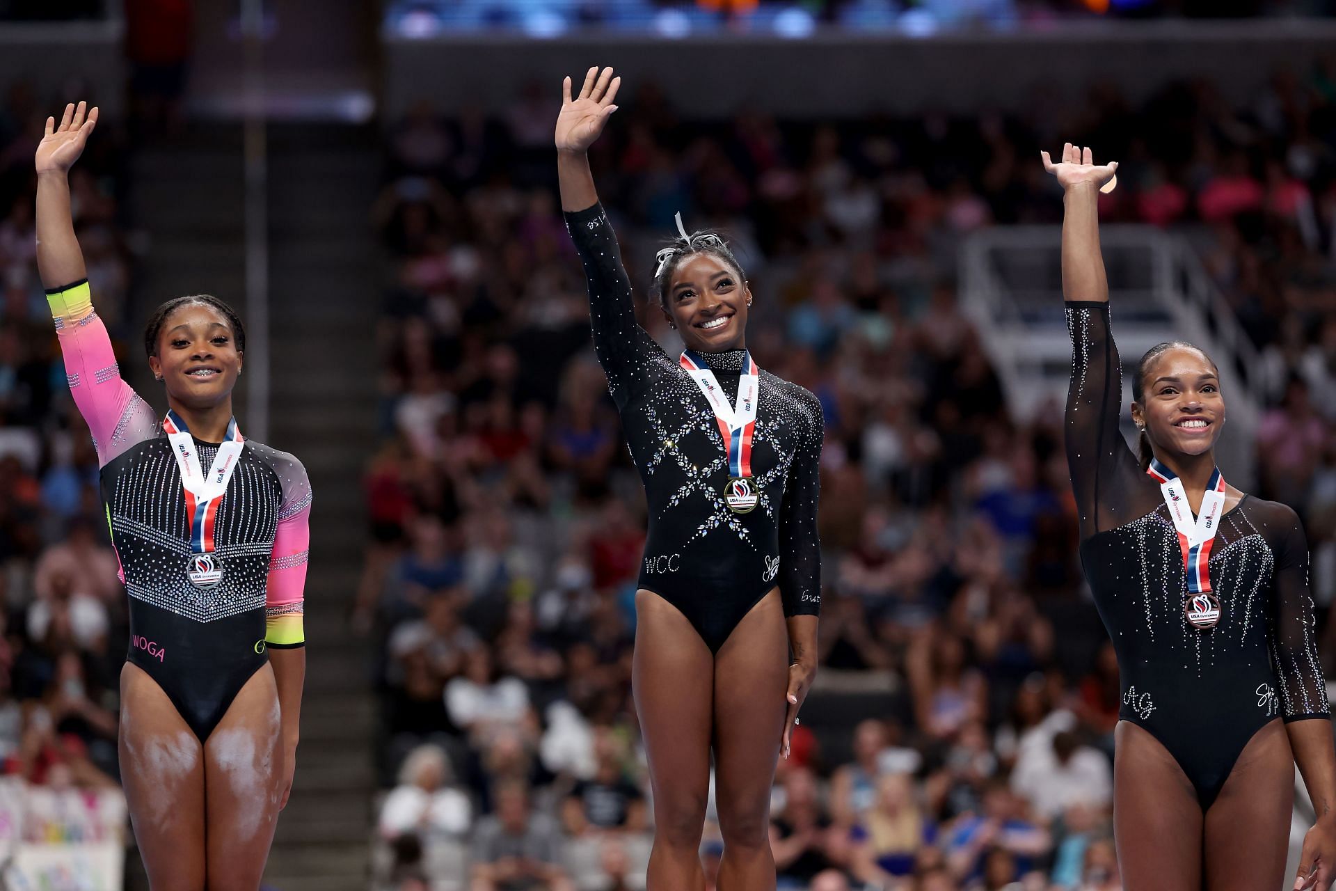 Kaliya Lincoln, Simone Biles, and Shi Jones celebrate after winning the floor exercise at the 2023 U.S. Gymnastics Championships at SAP Center in San Jose, California