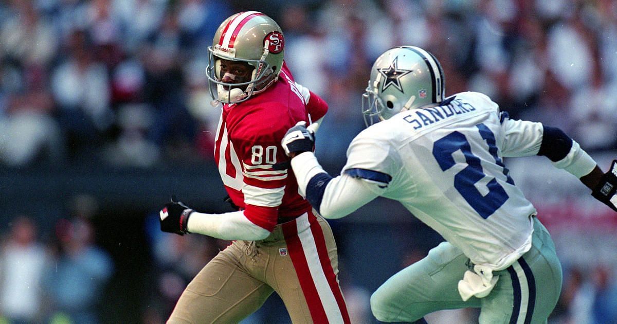 Baltimore Ravens cornerback Deion Sanders lines up against the