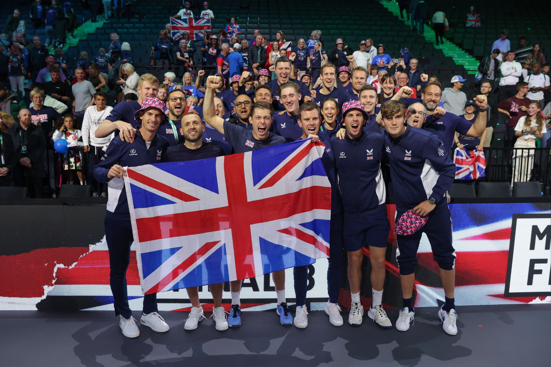 Team Great Britain poses after qualifying for the Final 8 of the 2023 Davis Cup Finals.