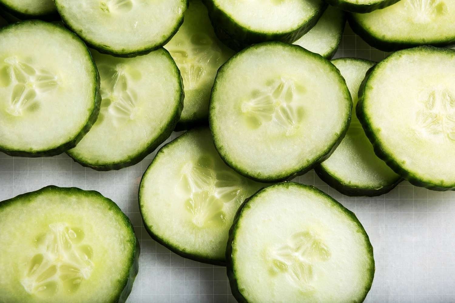 Eating cucumber at night (Image via Getty Images)