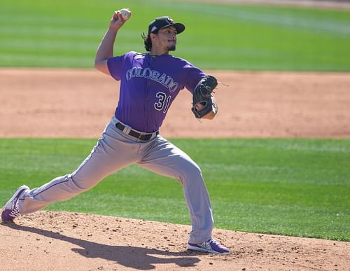 Dereck Rodríguez pitches during a spring training game against the Los Angeles Dodgers at Camelback Ranch