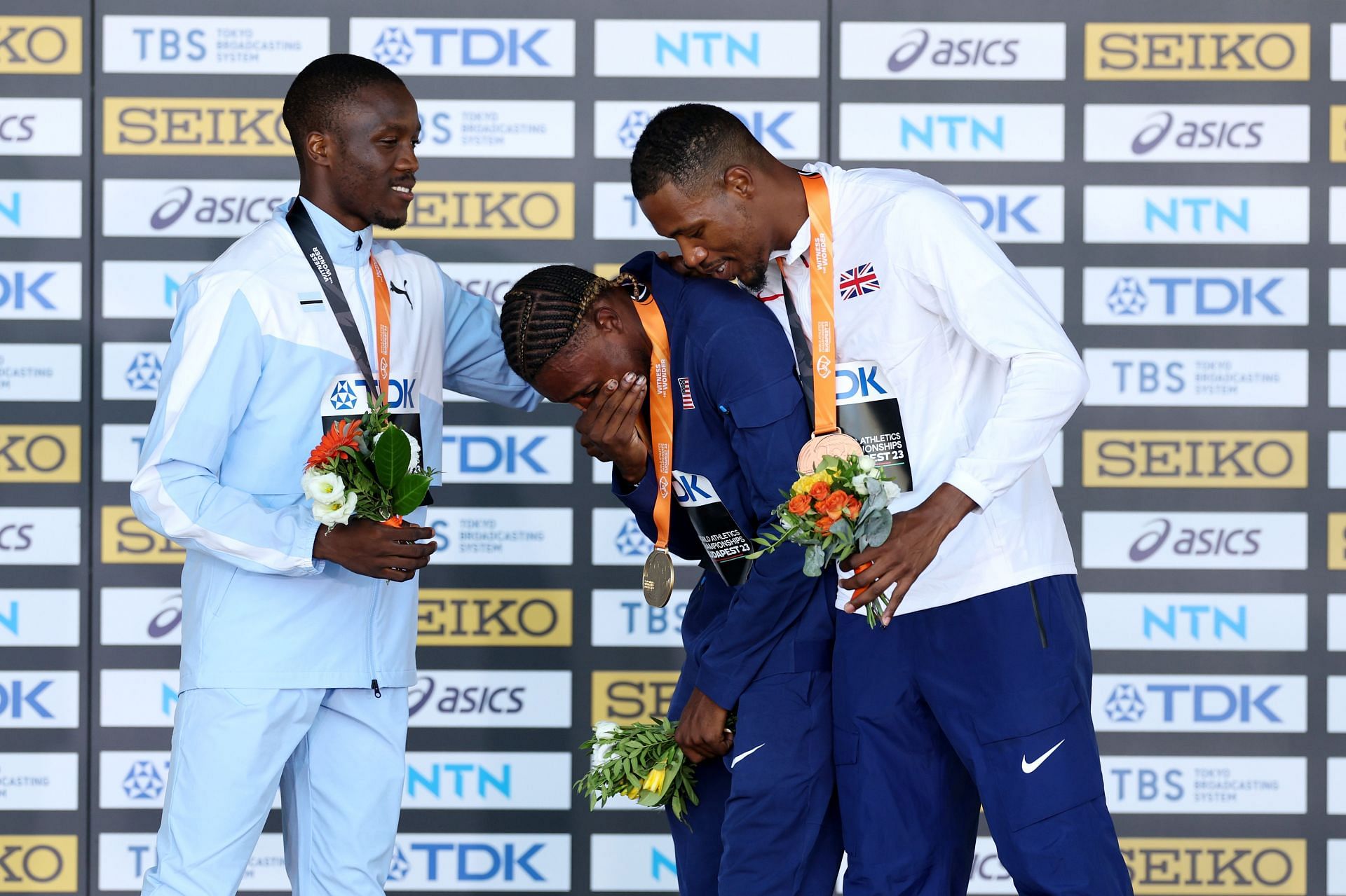 Noah Lyles gets emotional during the medal ceremony of the men&#039;s 100m final at the 2023 World Athletics Championships in Budapest, Hungary