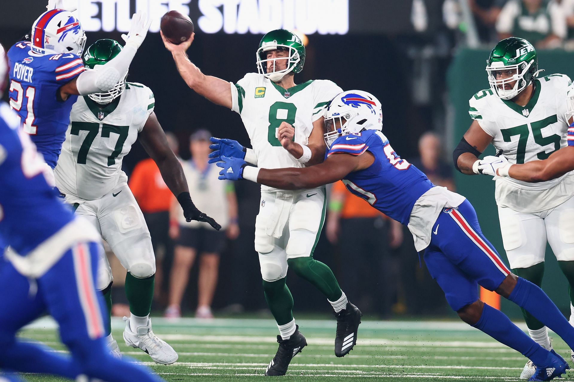 Aaron Rodgers getting hit during Buffalo Bills v New York Jets