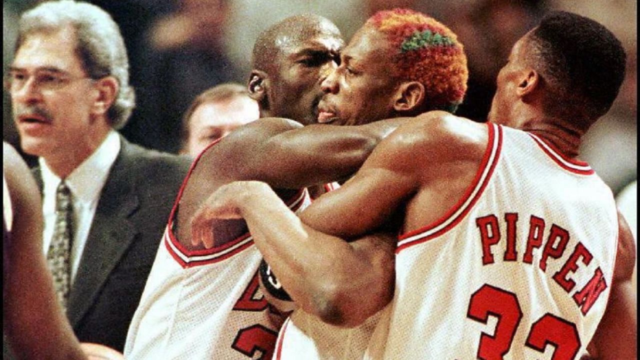 Michael Jordan and Scottie Pippen trying to keep Dennis Rodman from an altercation with Shaquille O