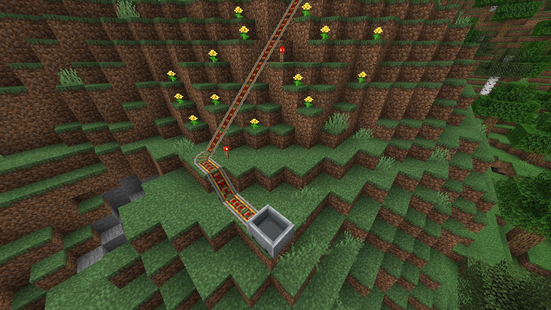 Rail system to push villagers up a hill in Minecraft (Image via Mojang)