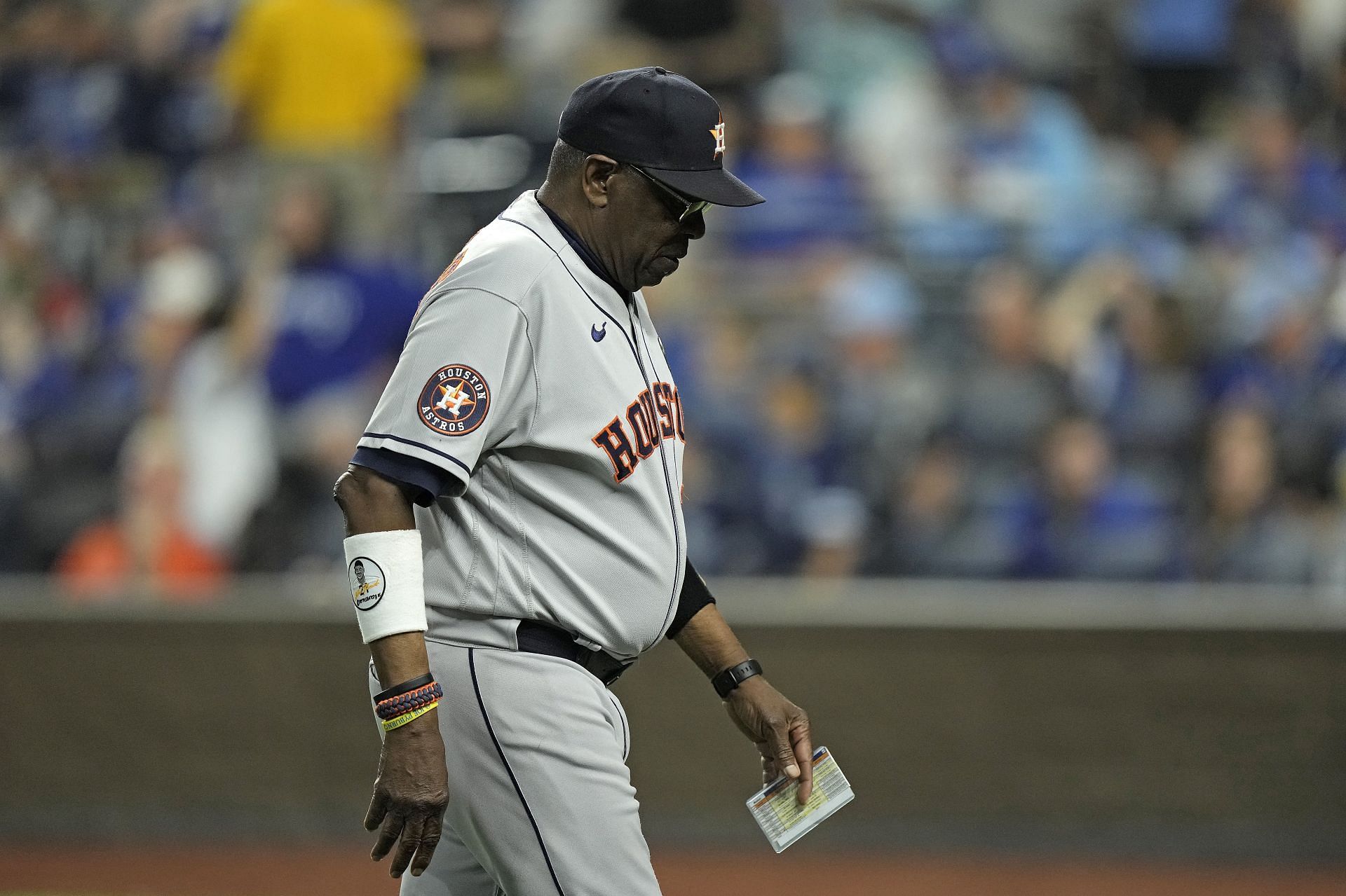 Houston Astros manager Dusty Baker Jr. walks to the dugout after making a pitching change in Kansas City