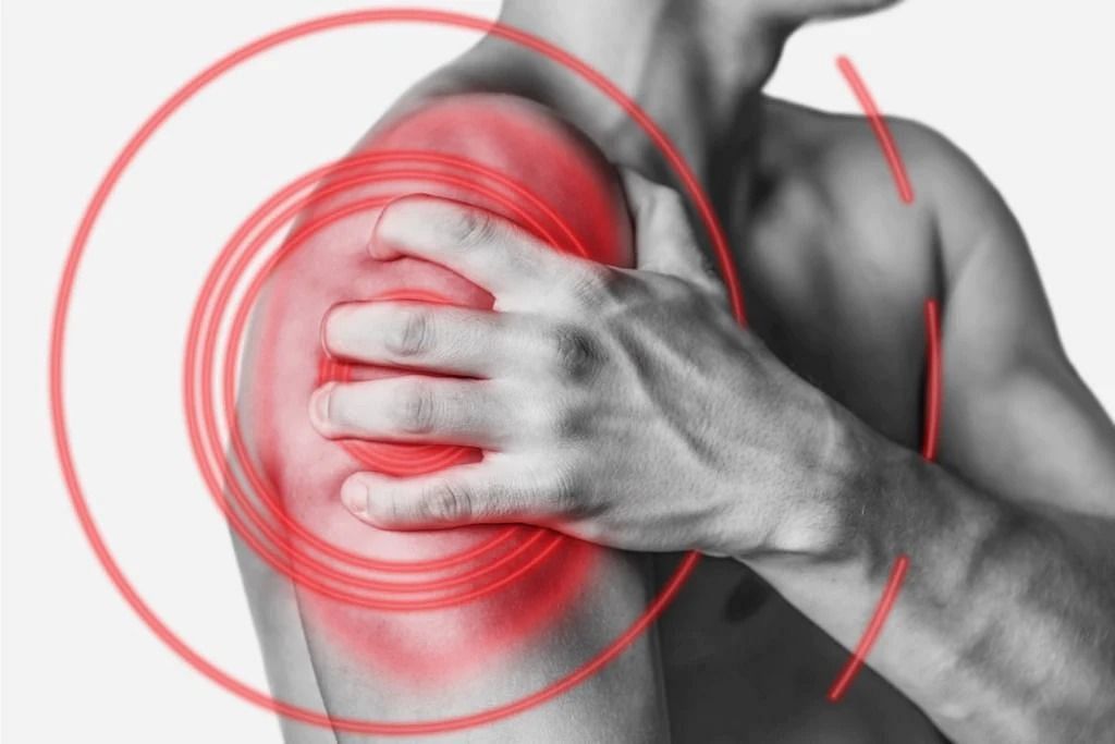 Shoulder pain from sleeping (Image via Getty Images)