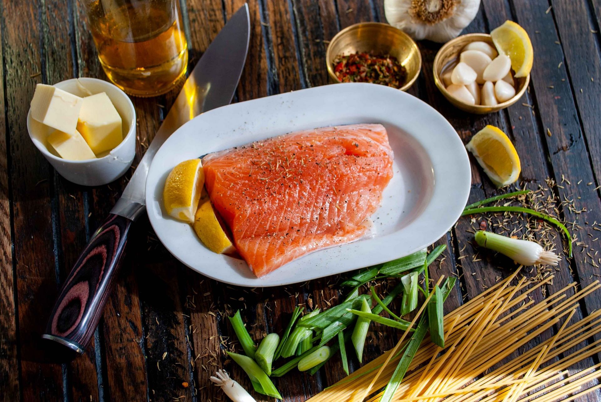 Salmon contains essential fatty acids (Image via Unsplash/David B Townsend)