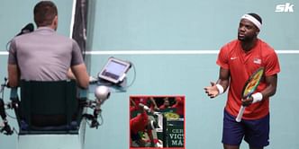 WATCH: Frances Tiafoe given point penalty on match point after smashing racquet due to disagreement over chair umpire call during USA's Davis Cup tie