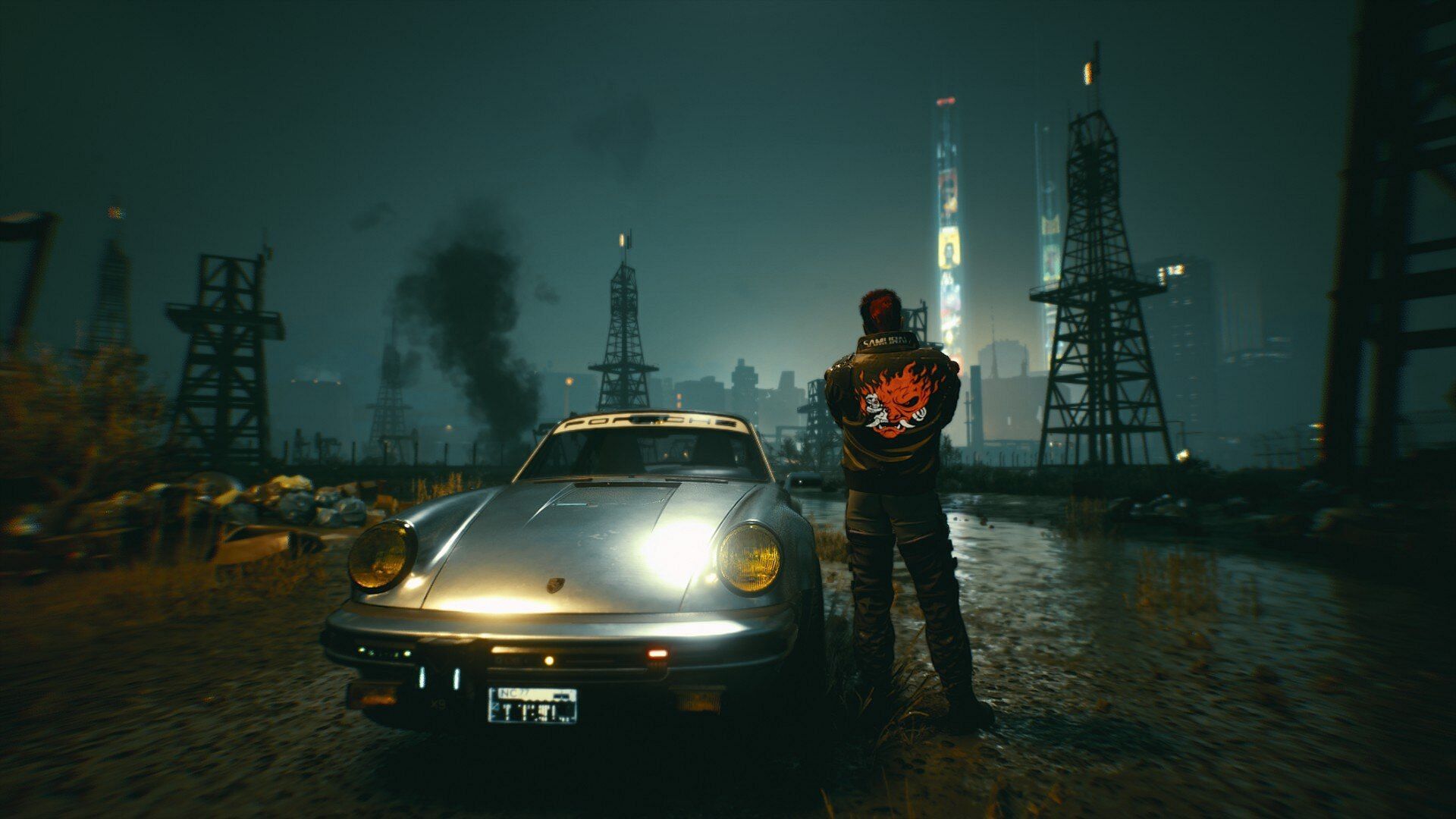 V standing beside Silverhand&#039;s iconic 911 and wearing his Samurai jacket (Image via CD Projekt Red)