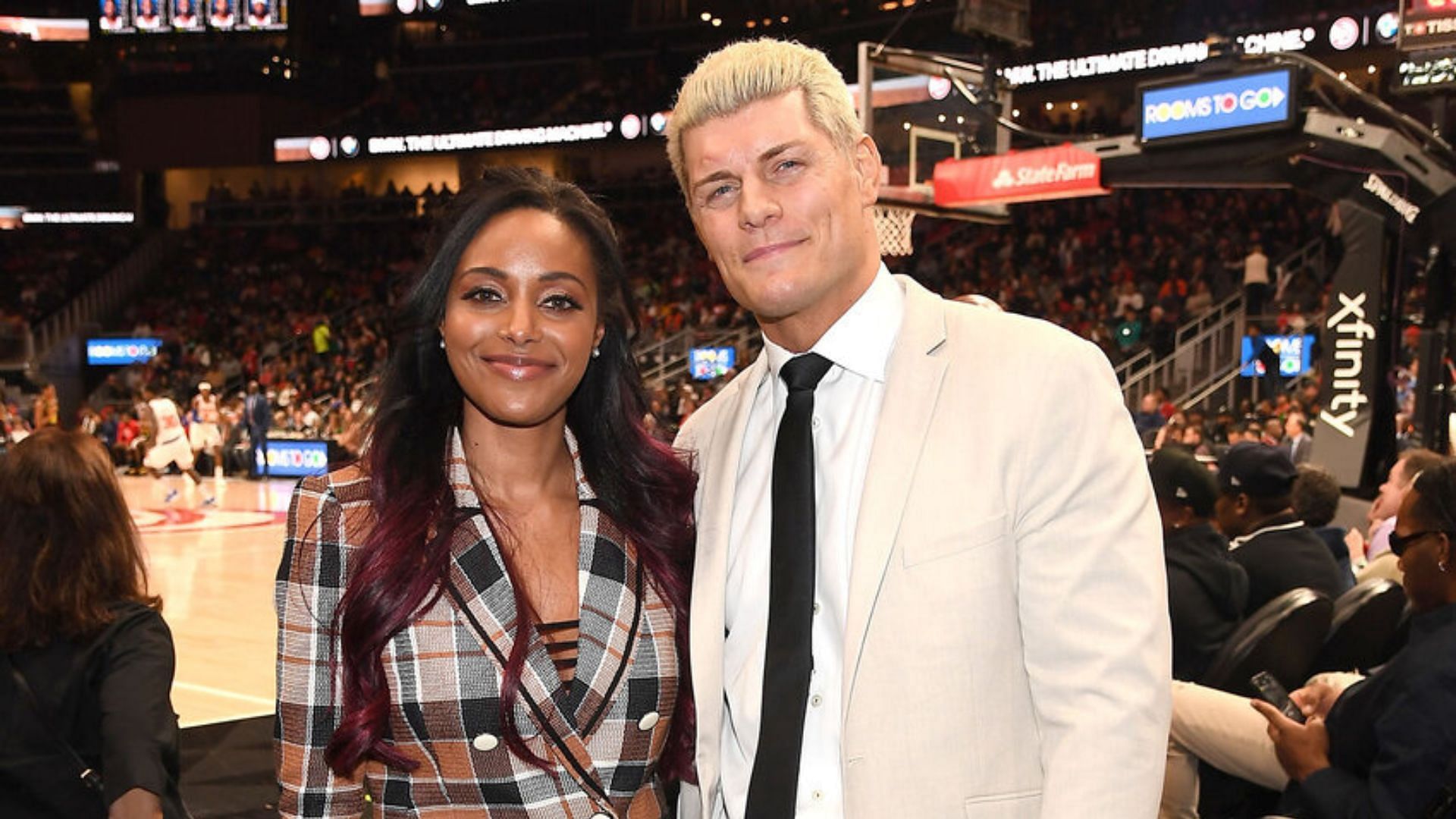 How have Brandi and Cody Rhodes balanced work and parenthood?