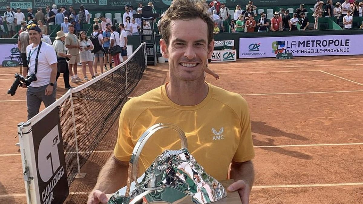 Andy Murray poses with the ATP Challenger title at Aix-en-Provence