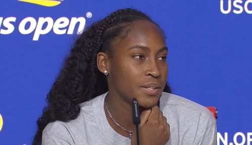 Coco Gauff talks to the media.