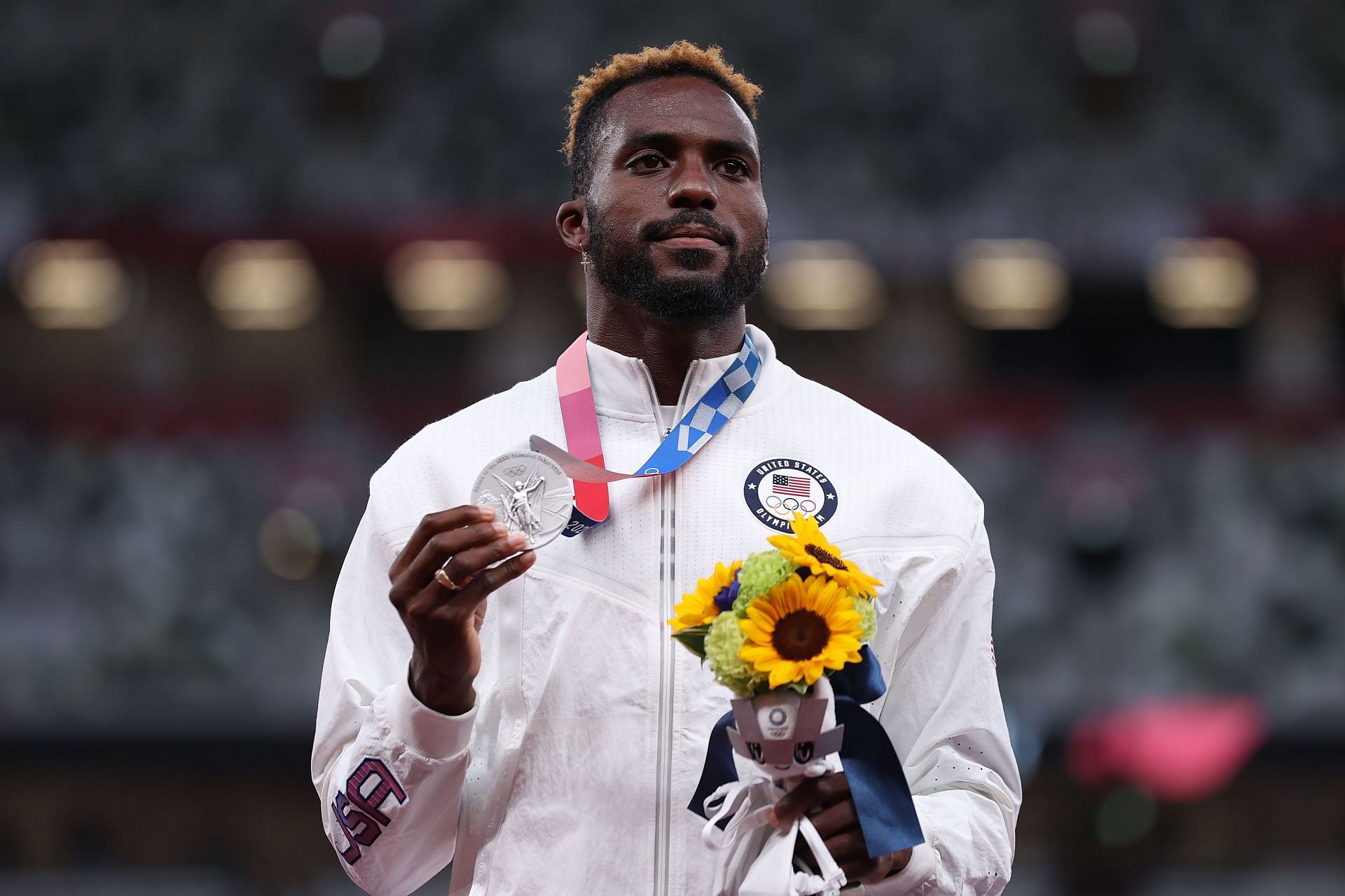 Kenny Bednarek poses with the silver medal after winning the men&#039;s 200m at the 2020 Tokyo Olympics in Japan