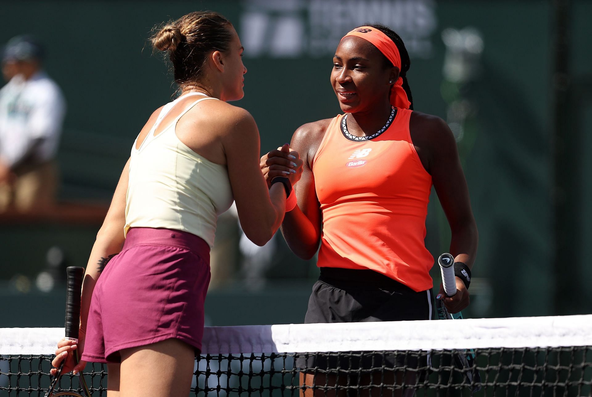 Aryna Sabalenka greets Coco Gauff.