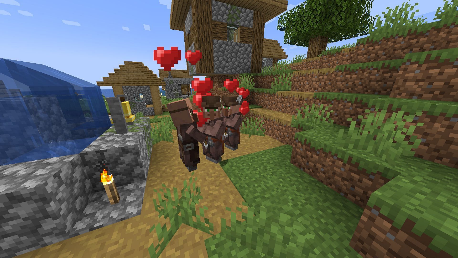 Villagers breeding with each other in Minecraft 1.20 (Image via Mojang Studios)