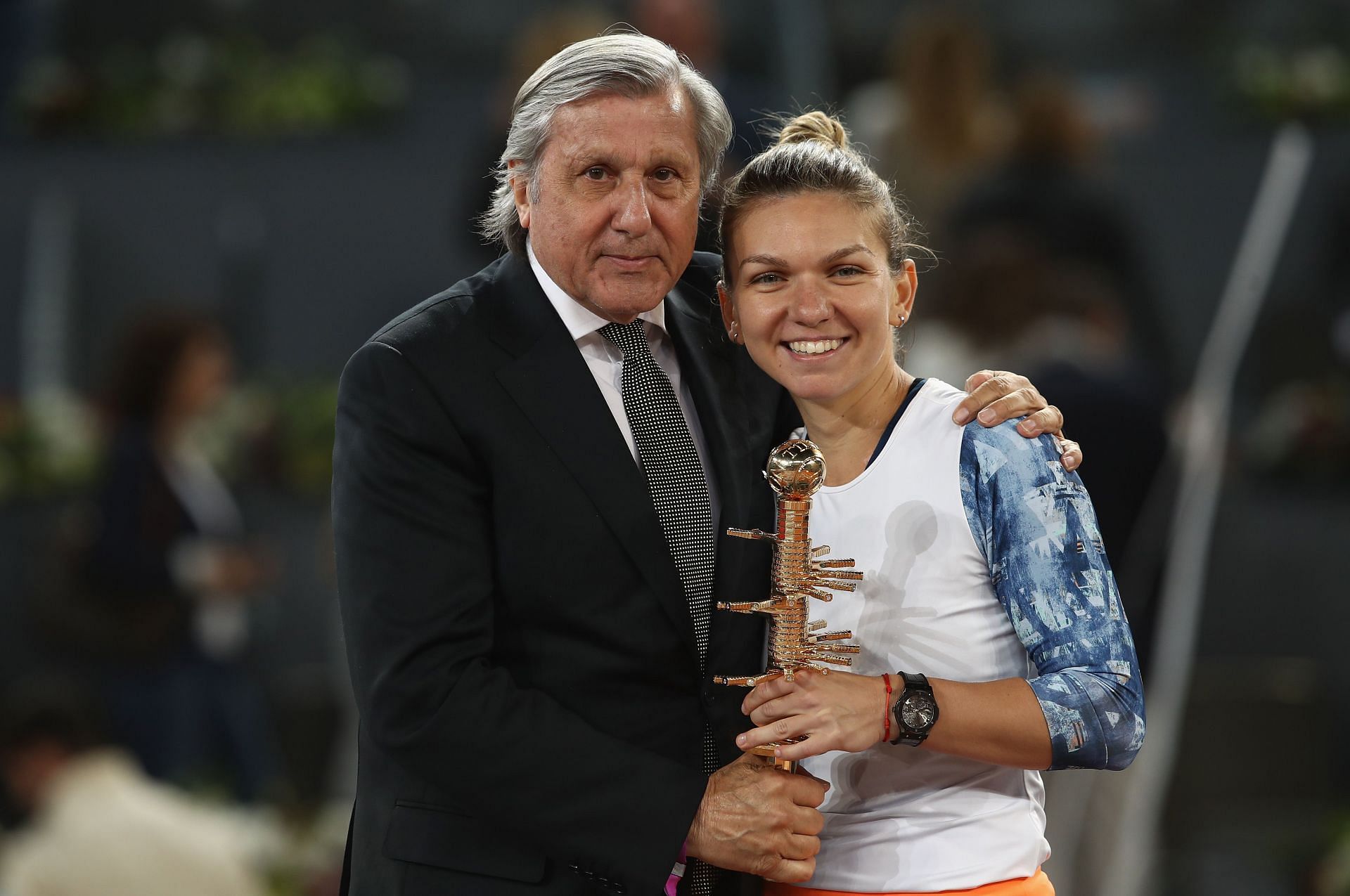 Ilie Nastase and Simona Halep at the 2017 Mutua Madrid Open