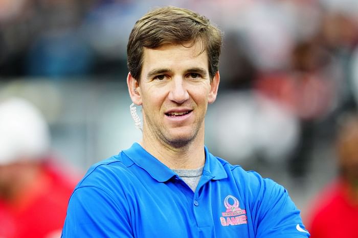 Eli Manning looked miserable when his brother locked up a second