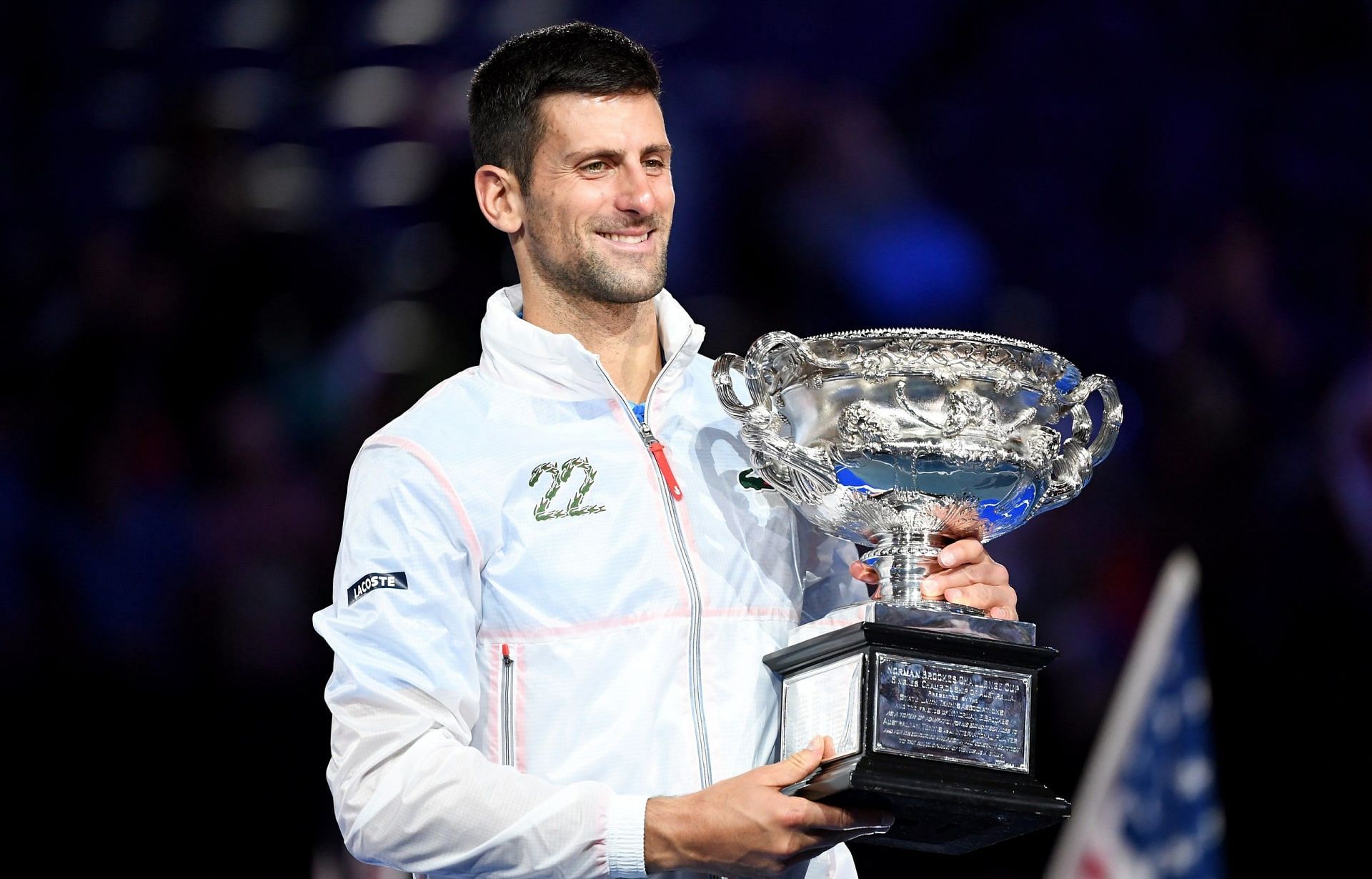 Novak Djokovic poses with the 2023 Australian Open title