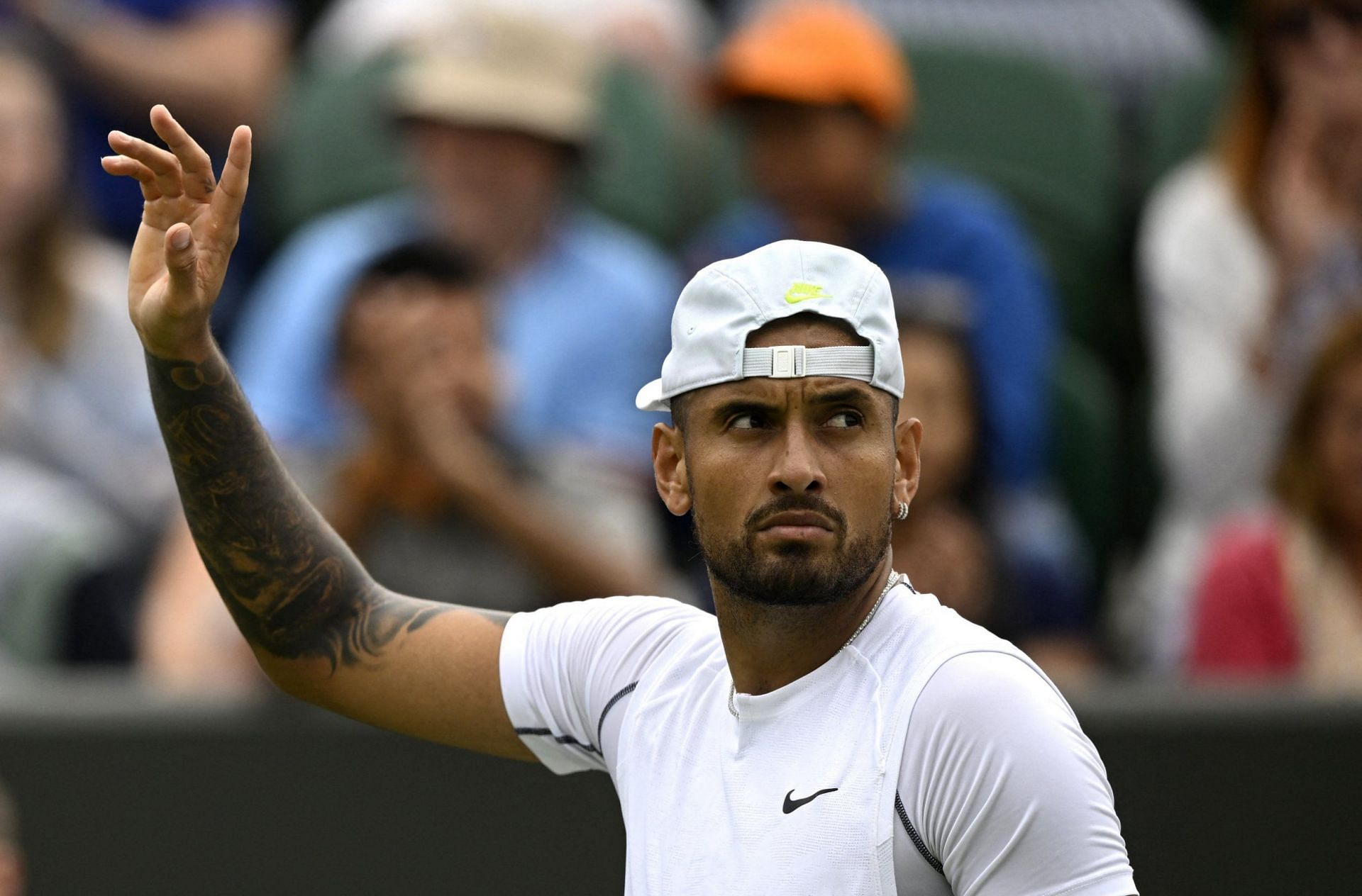 Nick Kyrgios waves to his fans at 2022 Wimbledon Championships