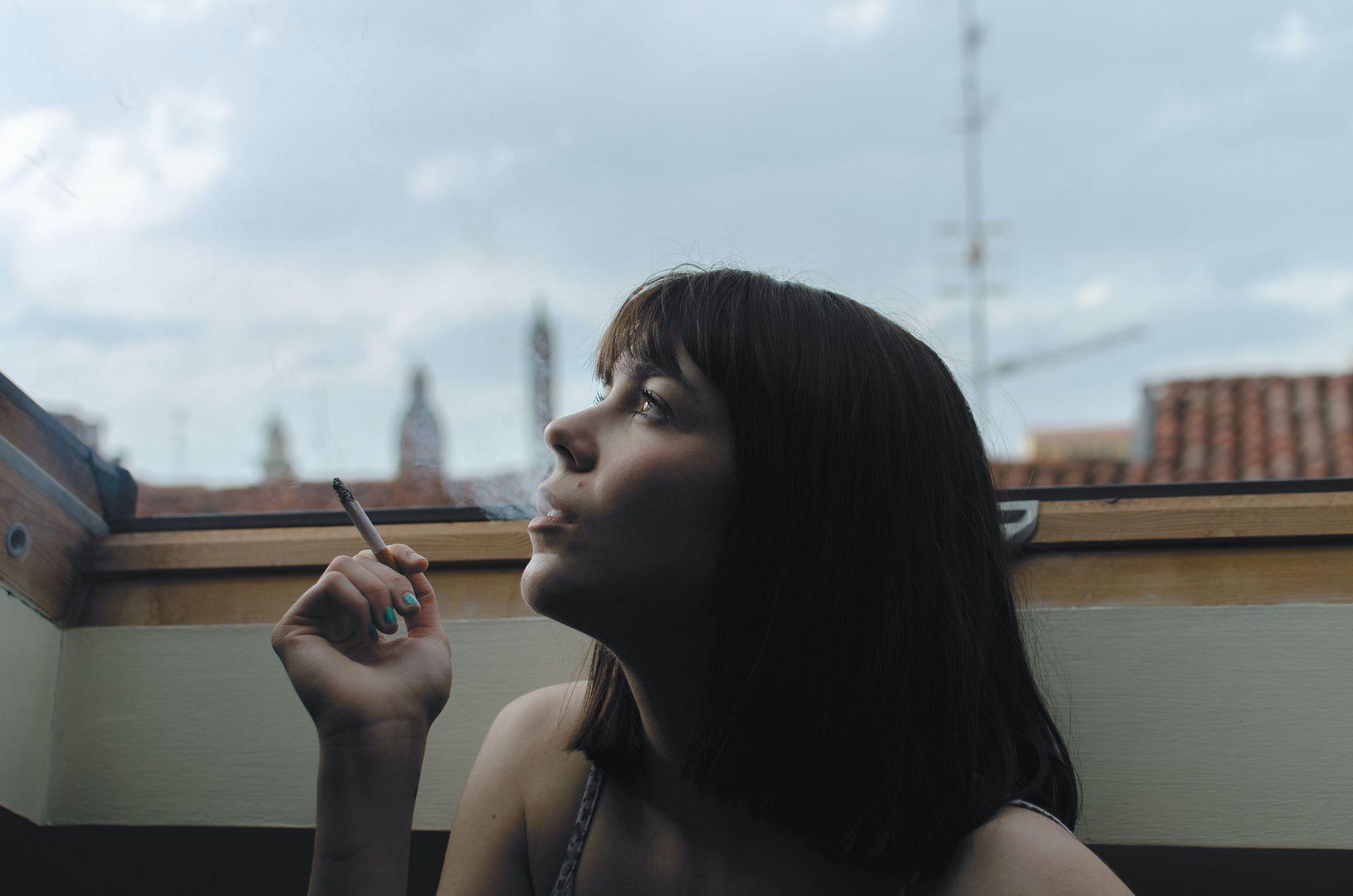 Stopping smoking may cause withdrawal symptoms. (Image via Unsplash/ Riccardo Fissore)