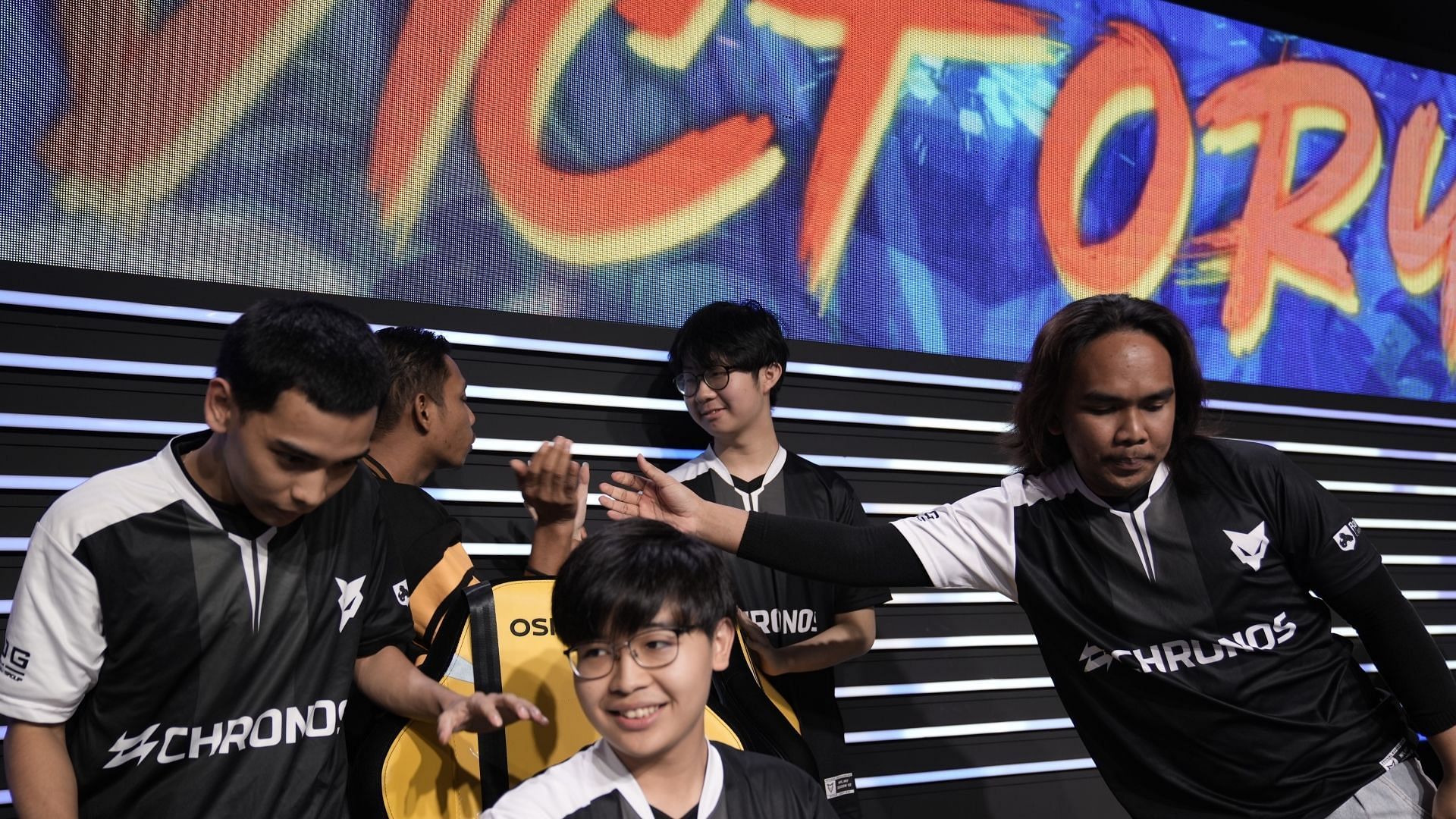 Team Lunatix players congratulating each other after win against team Secret (Image via Moonton Games)