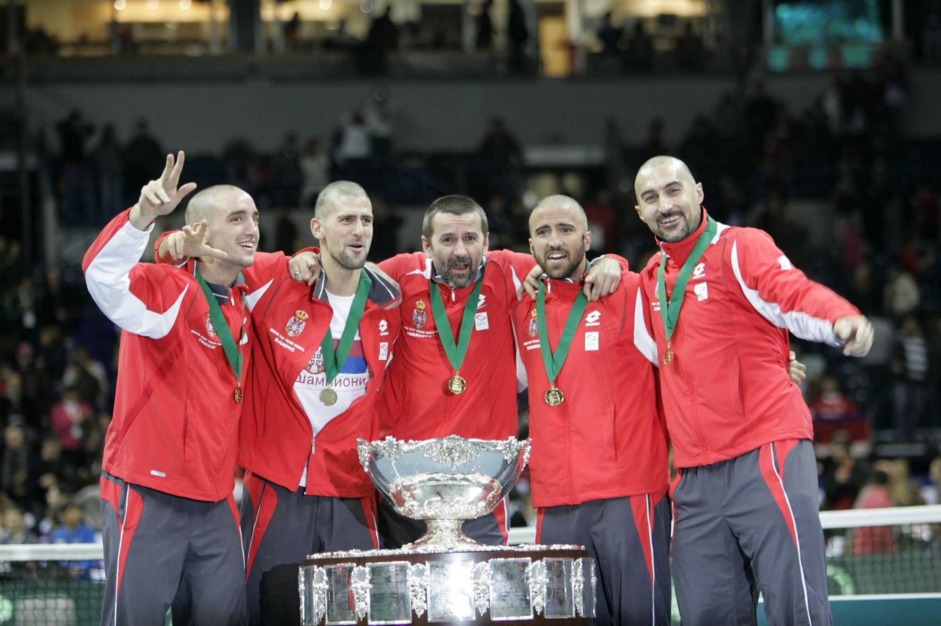 The Serbian Davis Cup team poses with the trophy in 2010