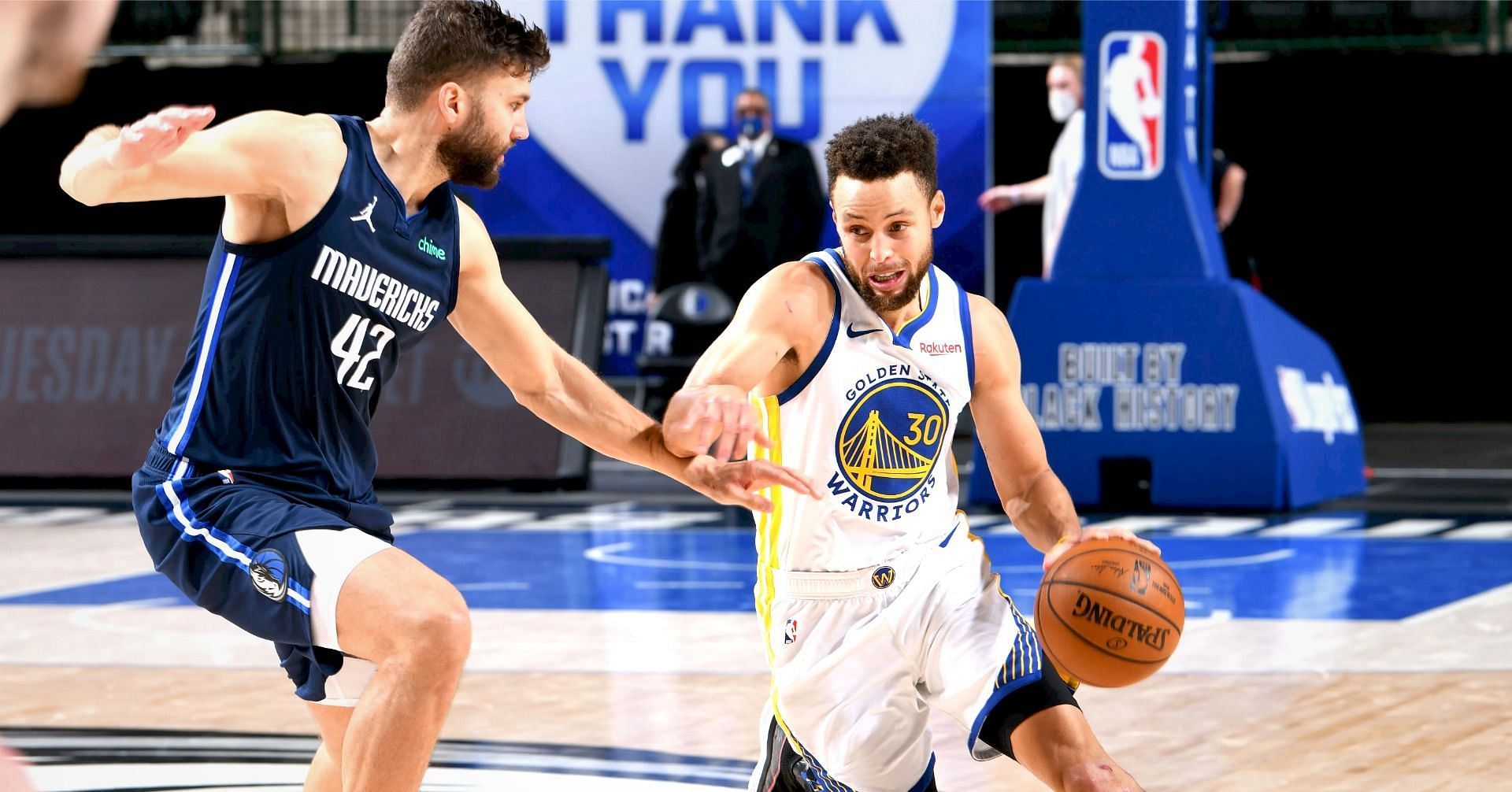 Dallas Mavericks big man Maxi Kleber and Golden State Warriors superstar point guard Steph Curry