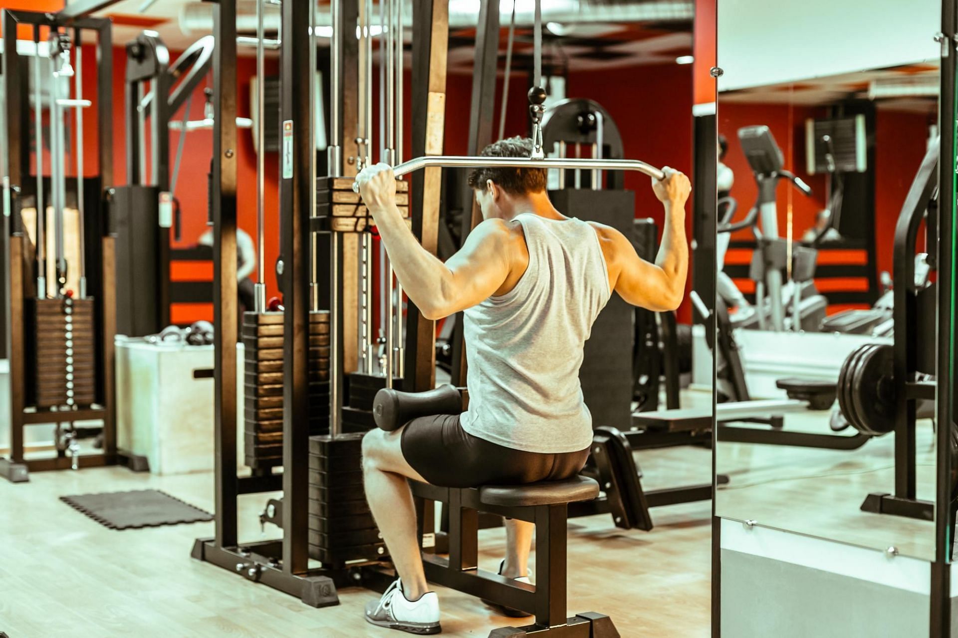 Lat pulldowns are an effective muscle building exercise.  (Image credits: Freepik)