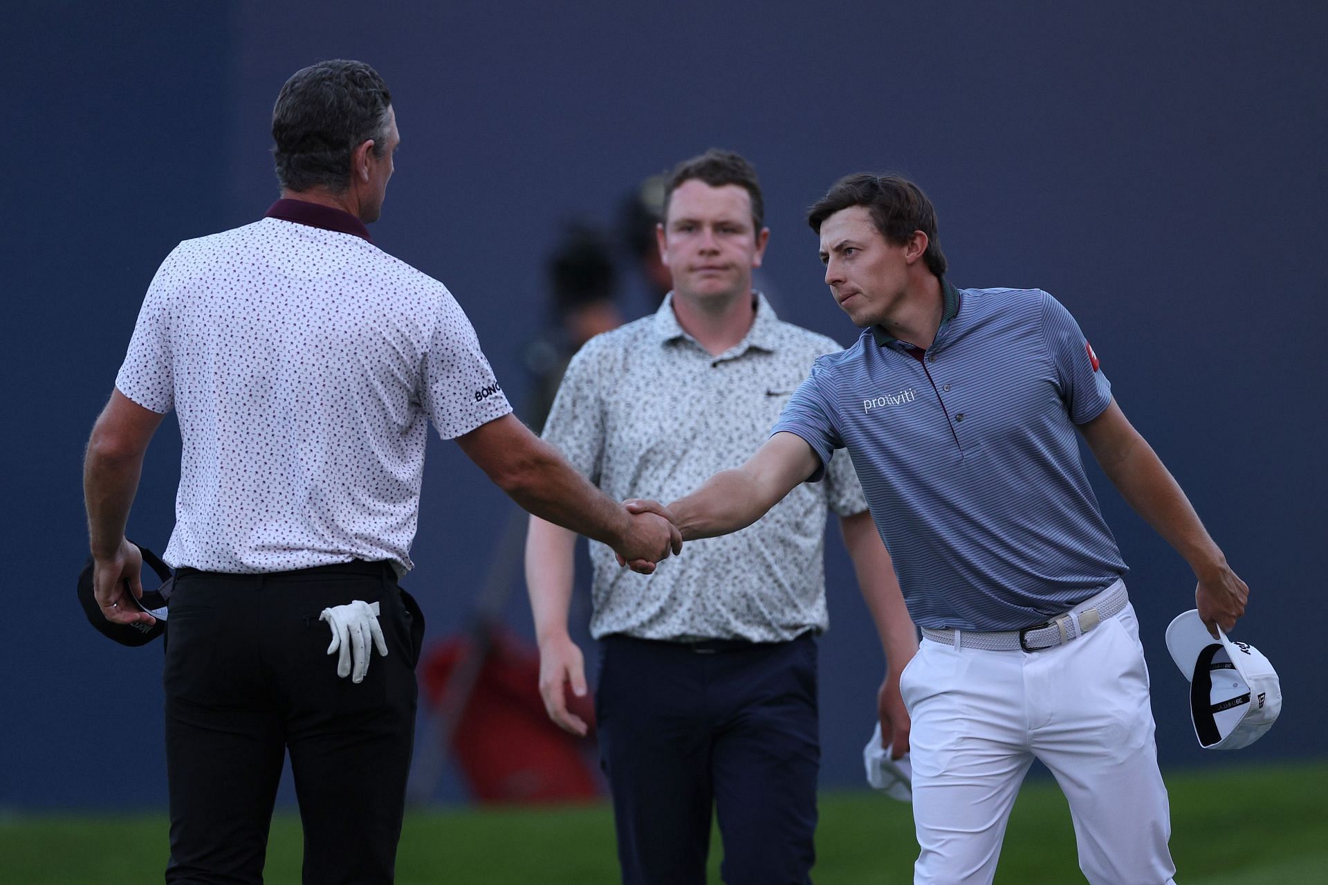 Matt Fitzpatrick shakes hands with Justin Rose after the first round of the BMW PGA Championship