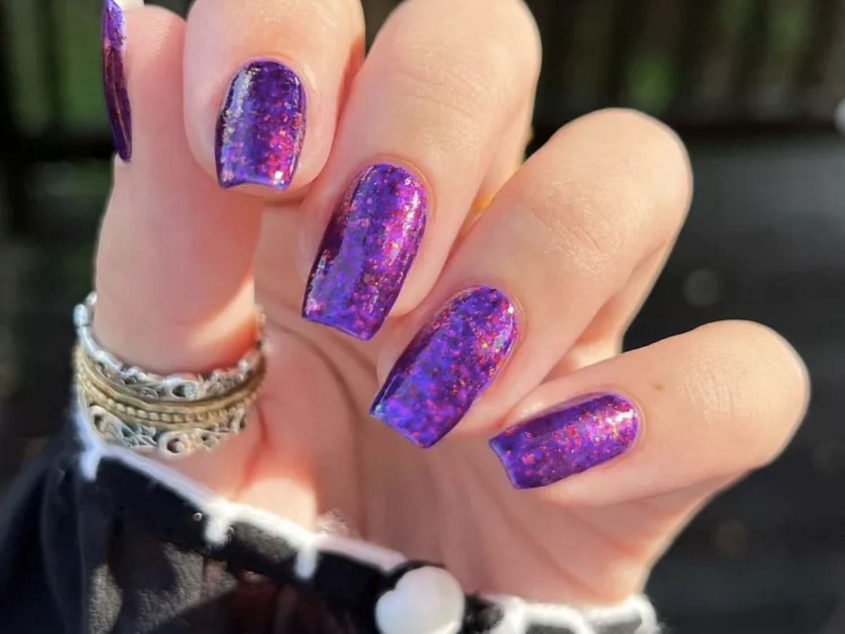 Violet-hued glitter nail art (Image via Sportskeeda)