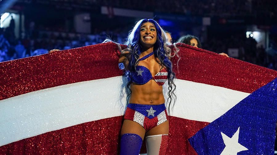 Zelina Vega showcasing her heritage at WWE Backlash in Puerto Rico.