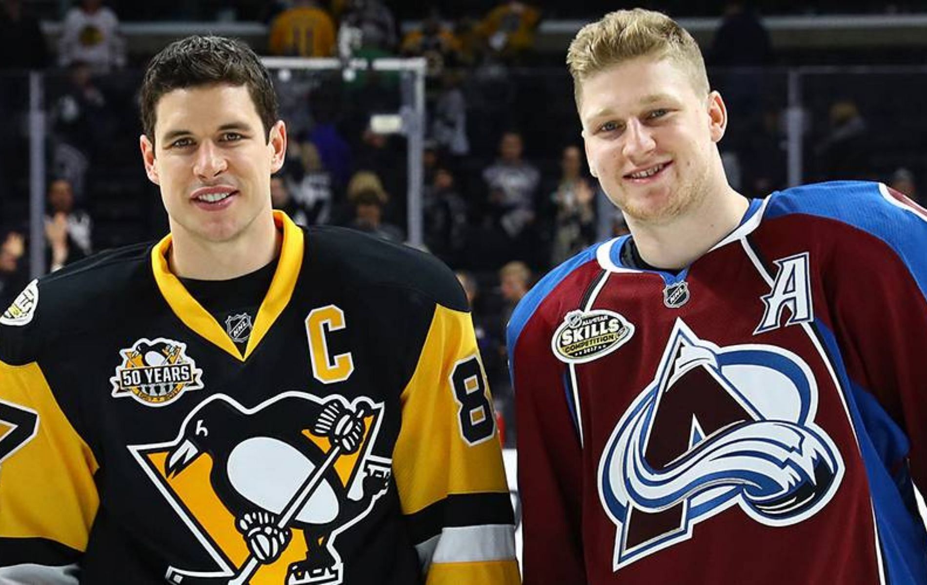 Sidney Crosby congratulates Nathan MacKinnon on jersey retirement (Image via NHLPA)