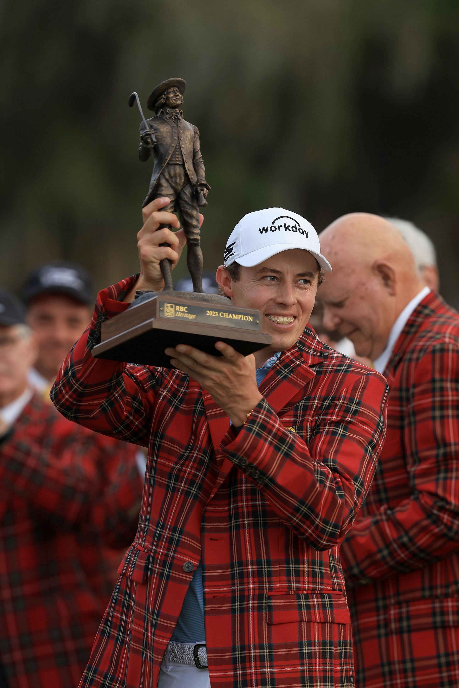 Matt Fitzpatrick of England celebrates with the trophy in the Heritage Plaid tartan jacket (Image via Getty)