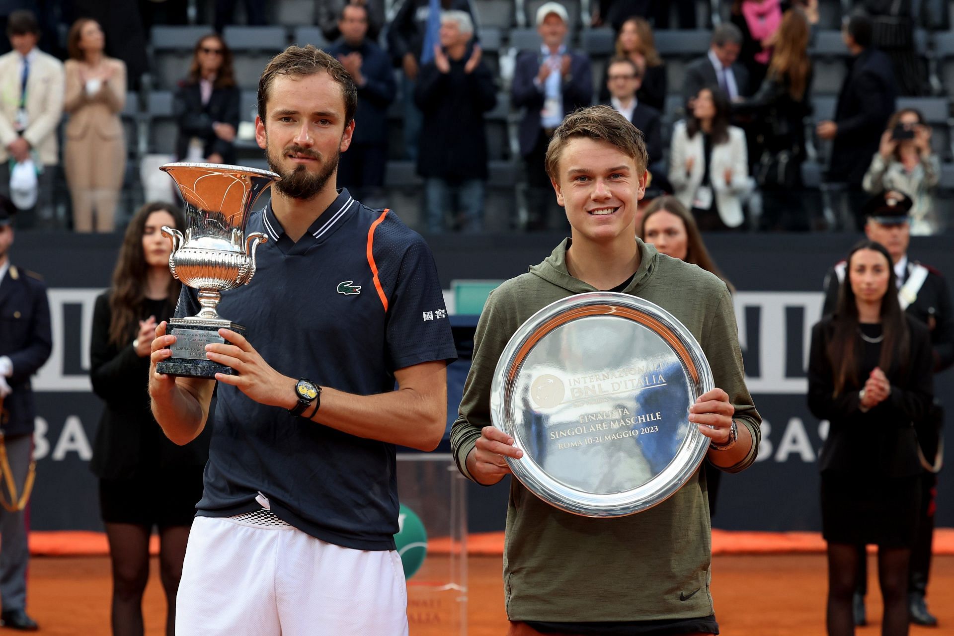 Holger Rune poses with the runner-up trophy at the 2023 Italian Open